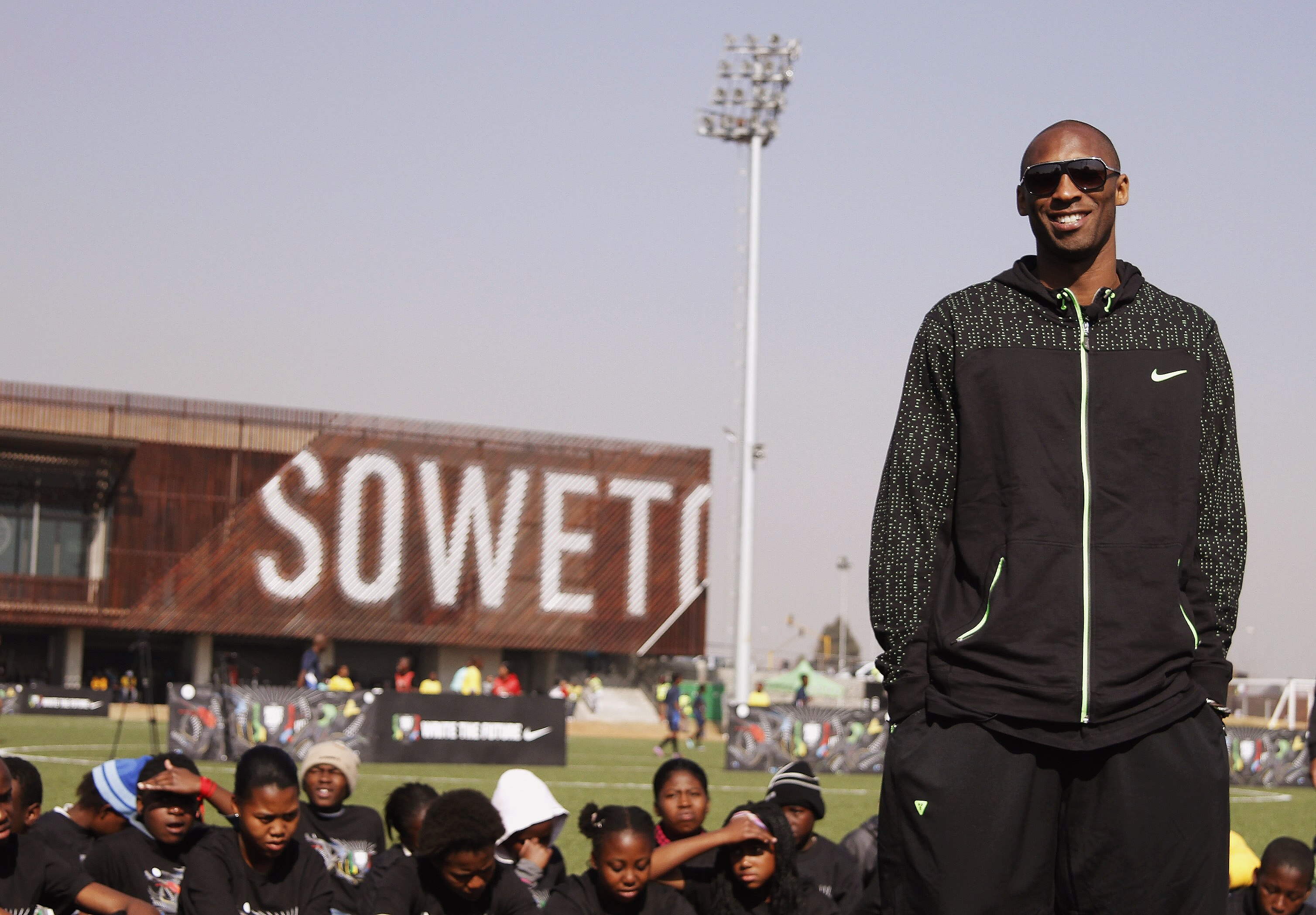 SOWETO, SOWETO - JUNE 27:  Basketball player Kobe Bryant visits a football centre during the 2010 FIFA World Cup South Africa on June 27, 2010 in Soweto, South Africa.  (Photo by Dominic Barnardt/Getty Images for Nike)
