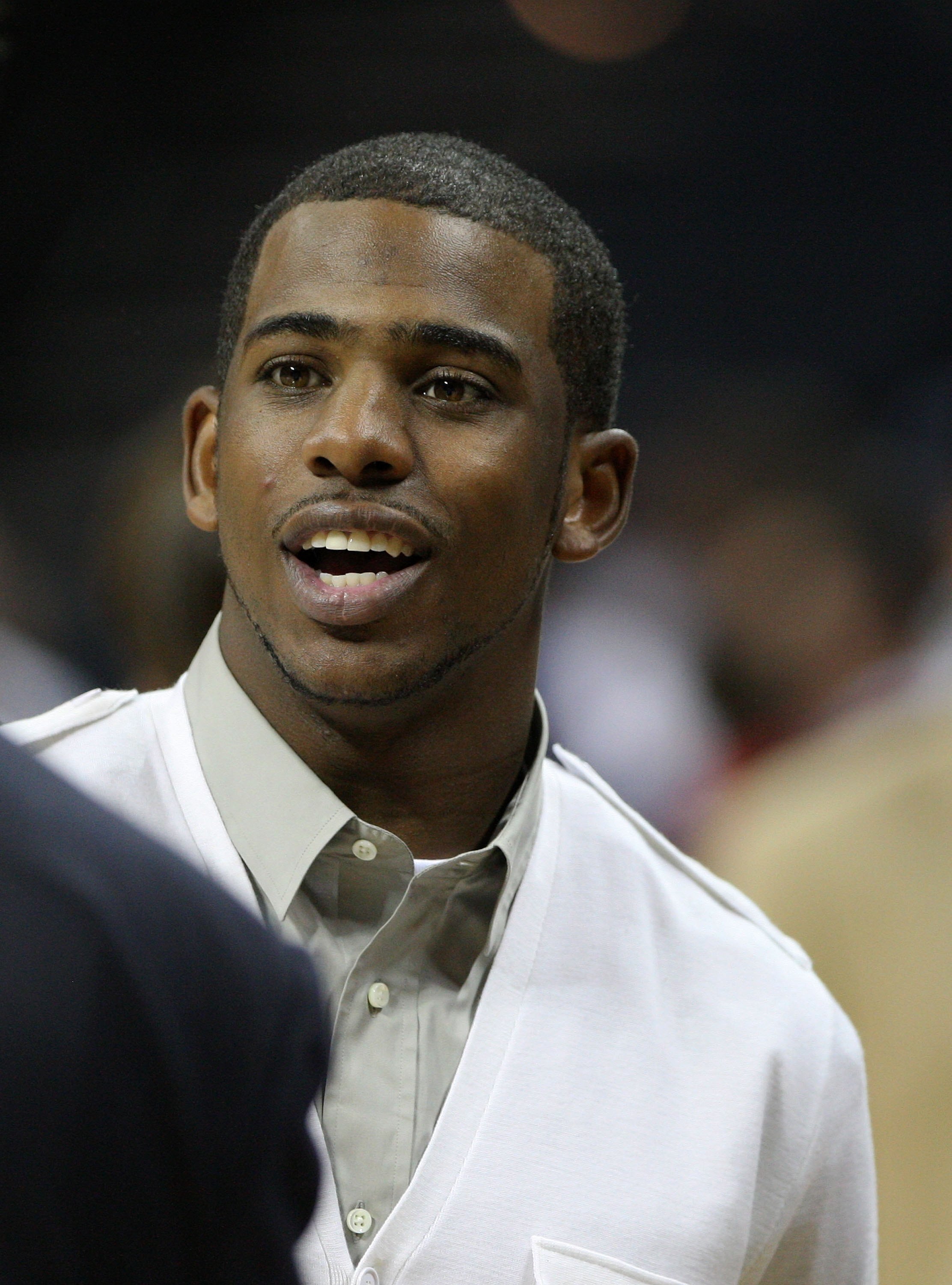 CHARLOTTE - APRIL 24:  New Orleans Hornets guard and former Wake Forest star Chris Paul talks on the court after Game Three of the Eastern Conference Quarterfinals between the Orlando Magic and the Charlotte Bobcats during the 2010 NBA Playoffs at Time Wa