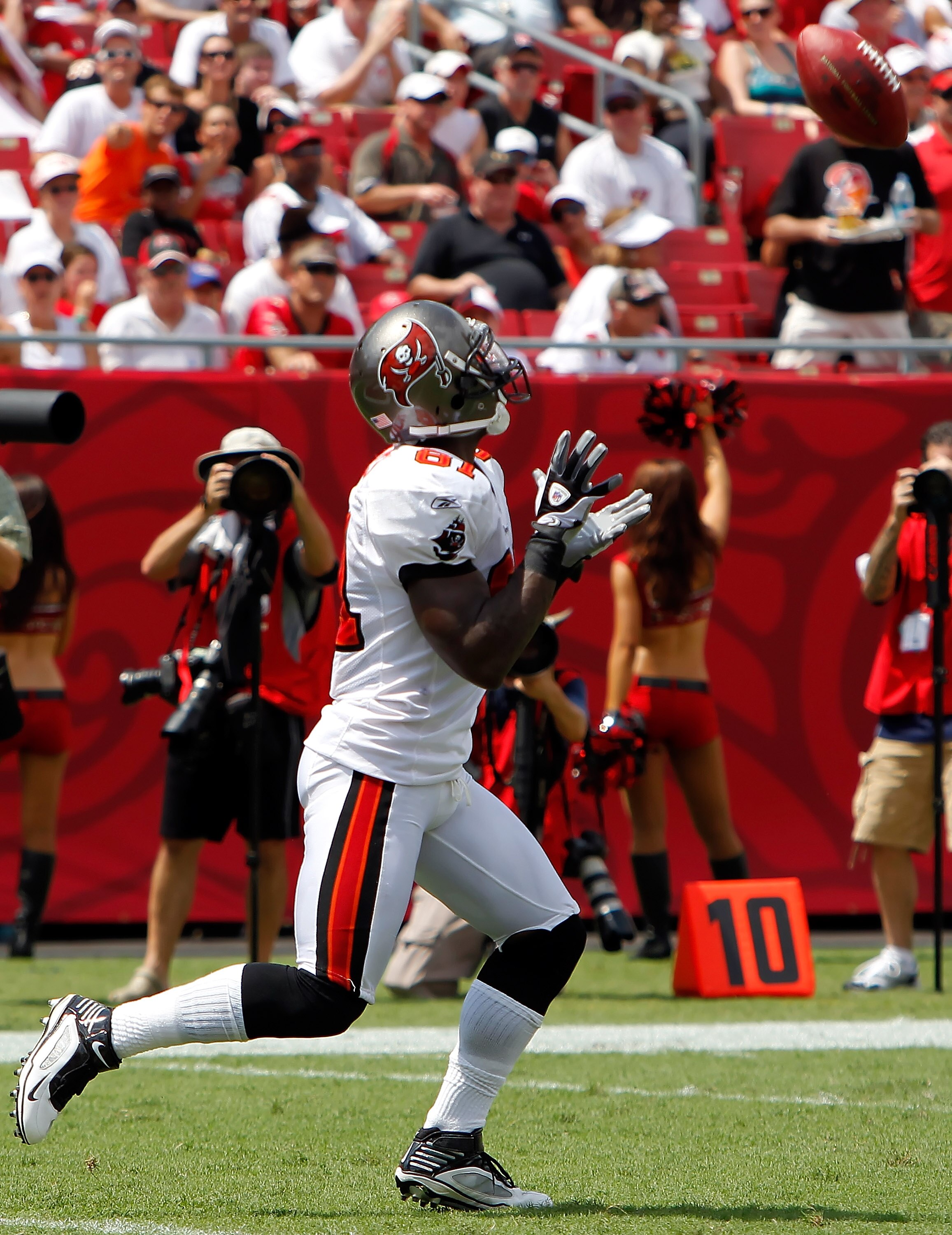 TAMPA, FL - SEPTEMBER 12:  Receiver Michael Spurlock #81 of the Tampa Bay Buccaneers receives this kick against the Cleveland Browns during the season opener game at Raymond James Stadium on September 12, 2010 in Tampa, Florida.  (Photo by J. Meric/Getty 
