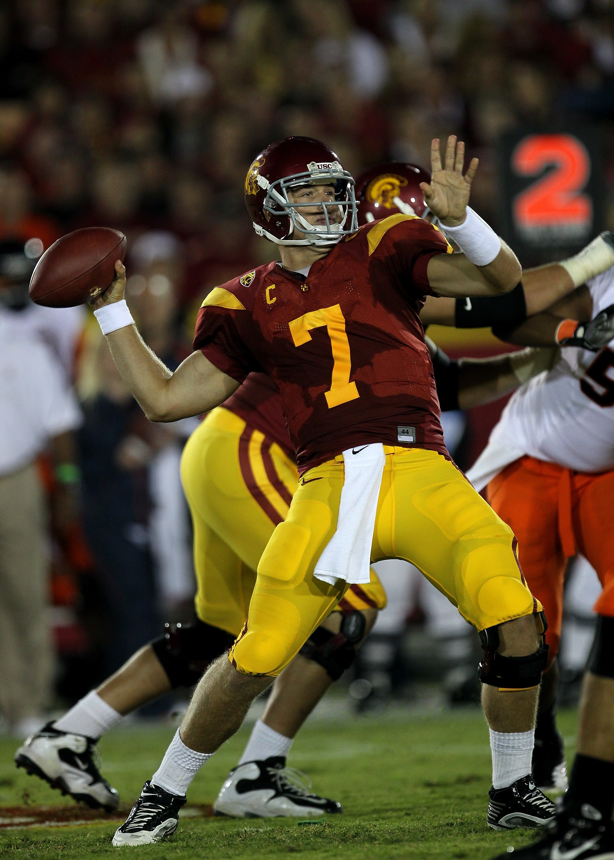 LOS ANGELES, CA - SEPTEMBER 11:  Quarterback Matt Barkley #7 of the USC Trojans throws a pass against the Virginia Cavaliers at Los Angeles Memorial Coliseum on September 11, 2010 in Los Angeles, California. USC won 17-14.   (Photo by Stephen Dunn/Getty I