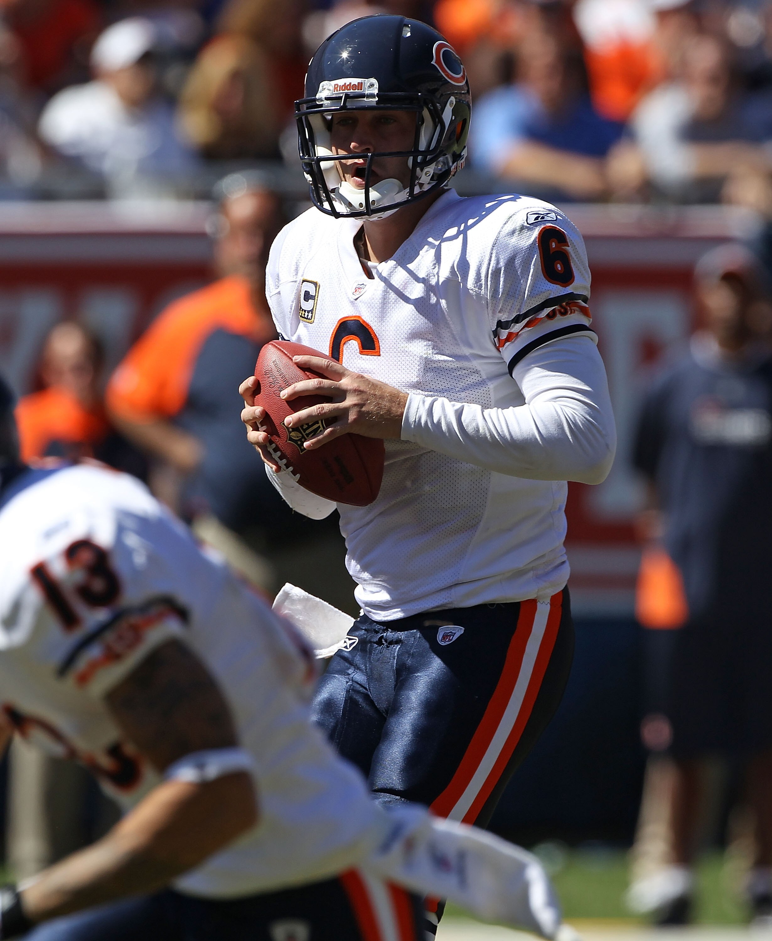 CHICAGO - SEPTEMBER 12: Jay Cutler #6 of the Chicago Bears looks for a receiver against the Detroit Lions during the NFL season opening game at Soldier Field on September 12, 2010 in Chicago, Illinois. The Bears defeated the Lions 19-14. (Photo by Jonatha