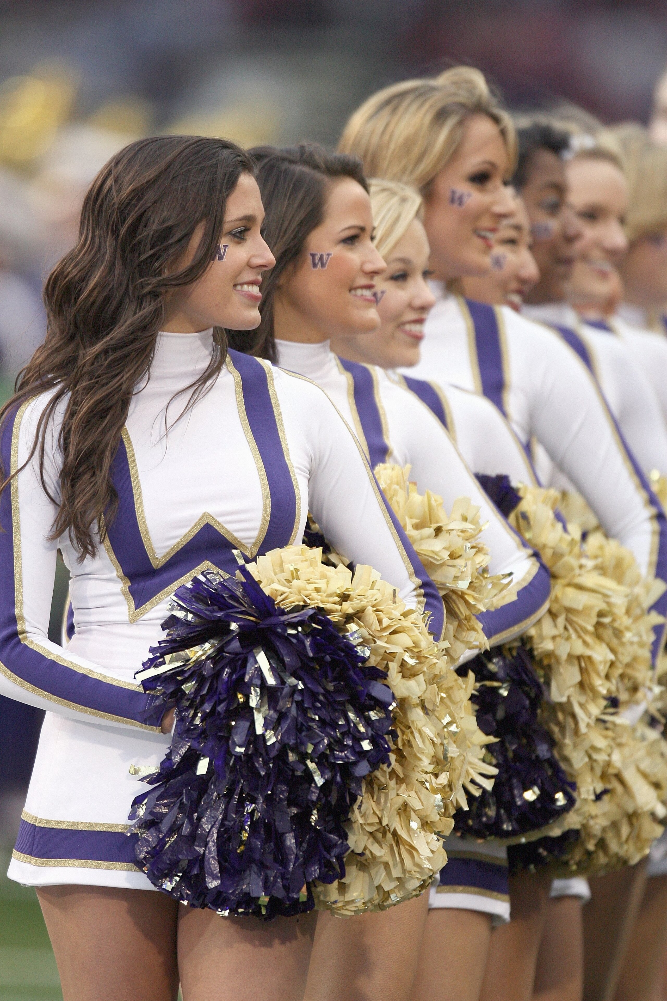 SEATTLE - NOVEMBER 28: Washington Huskies cheerleaders perform during the Apple Cup game against the Washington State Cougars on November 28, 2009 at Husky Stadium in Seattle, Washington. The Huskies defeated the Cougars 30-0. (Photo by Otto Greule Jr/Get