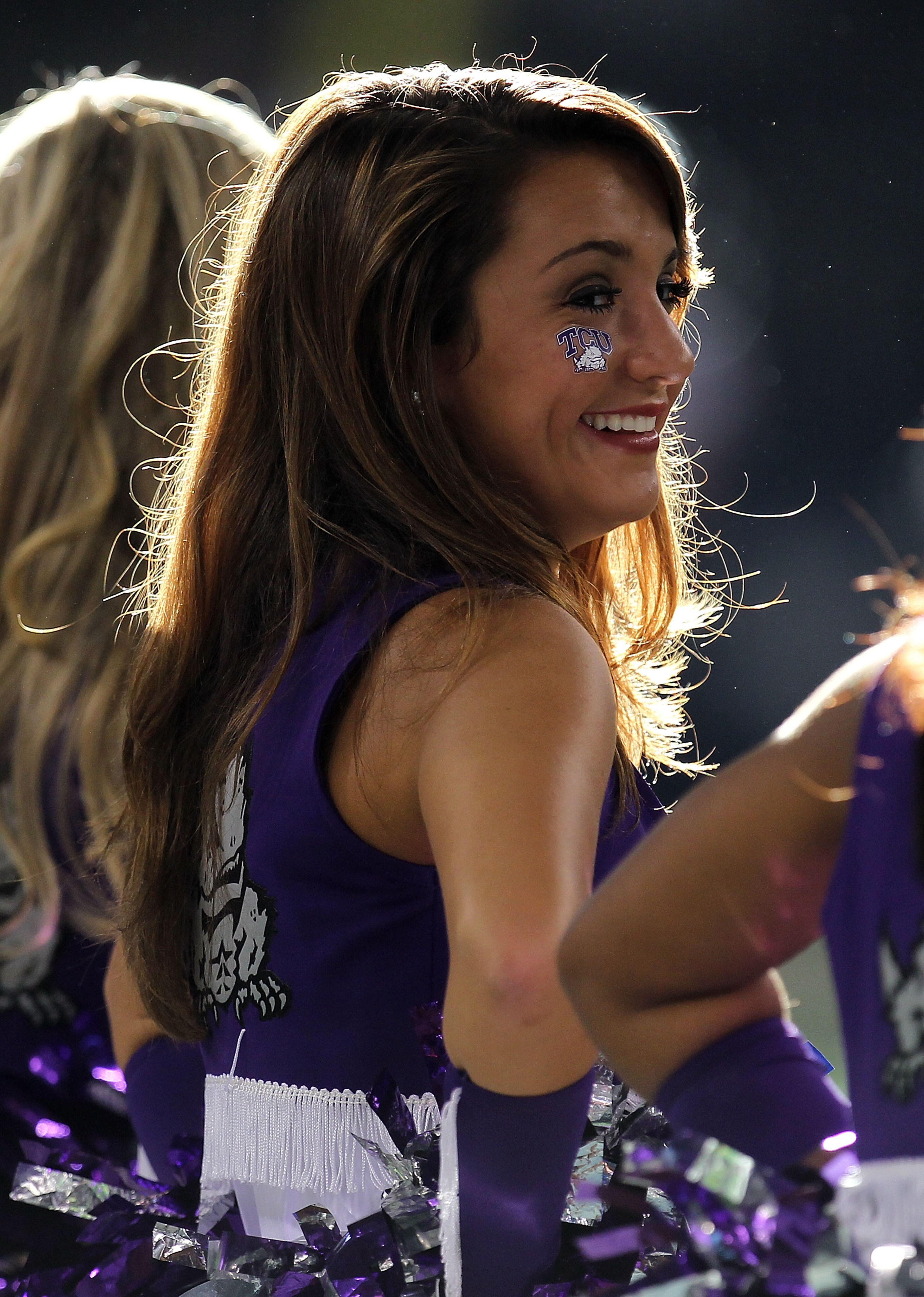 ARLINGTON, TX - SEPTEMBER 04:  A TCU Horned Frogs cheerleader smiles during a game against the Oregon State Beavers at Cowboys Stadium on September 4, 2010 in Arlington, Texas.  (Photo by Ronald Martinez/Getty Images)