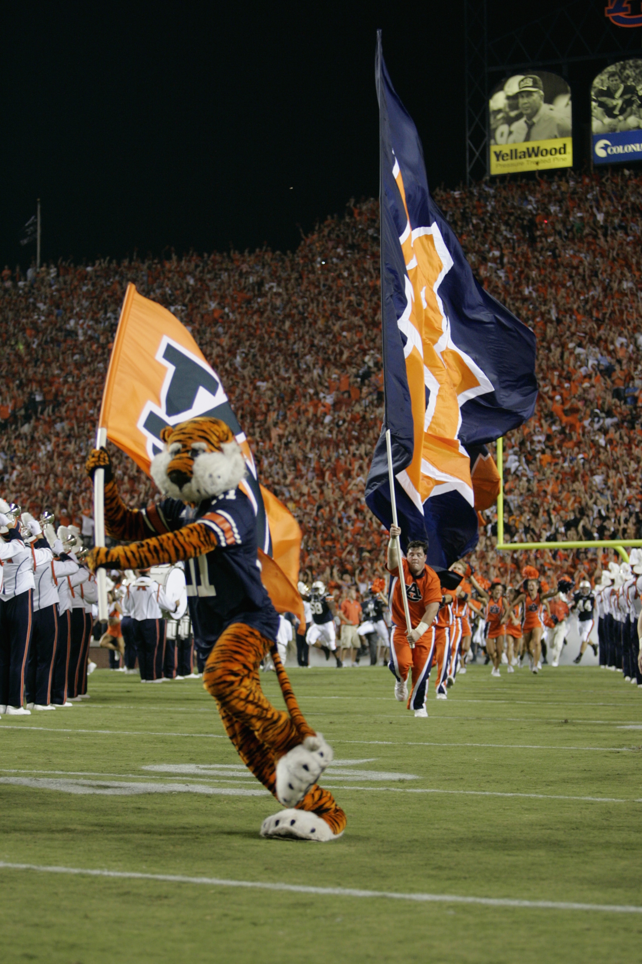 AUBURN, AL - SEPTEMBER 3:  The Auburn Tigers mascot leads the cheerleaders and team out onto the field prior to the start of the game against the Georgia Tech Yellow Jackets on September 3, 2005 at Jordan-Hare Stadium in Auburn, Alabama.  Georgia Tech won