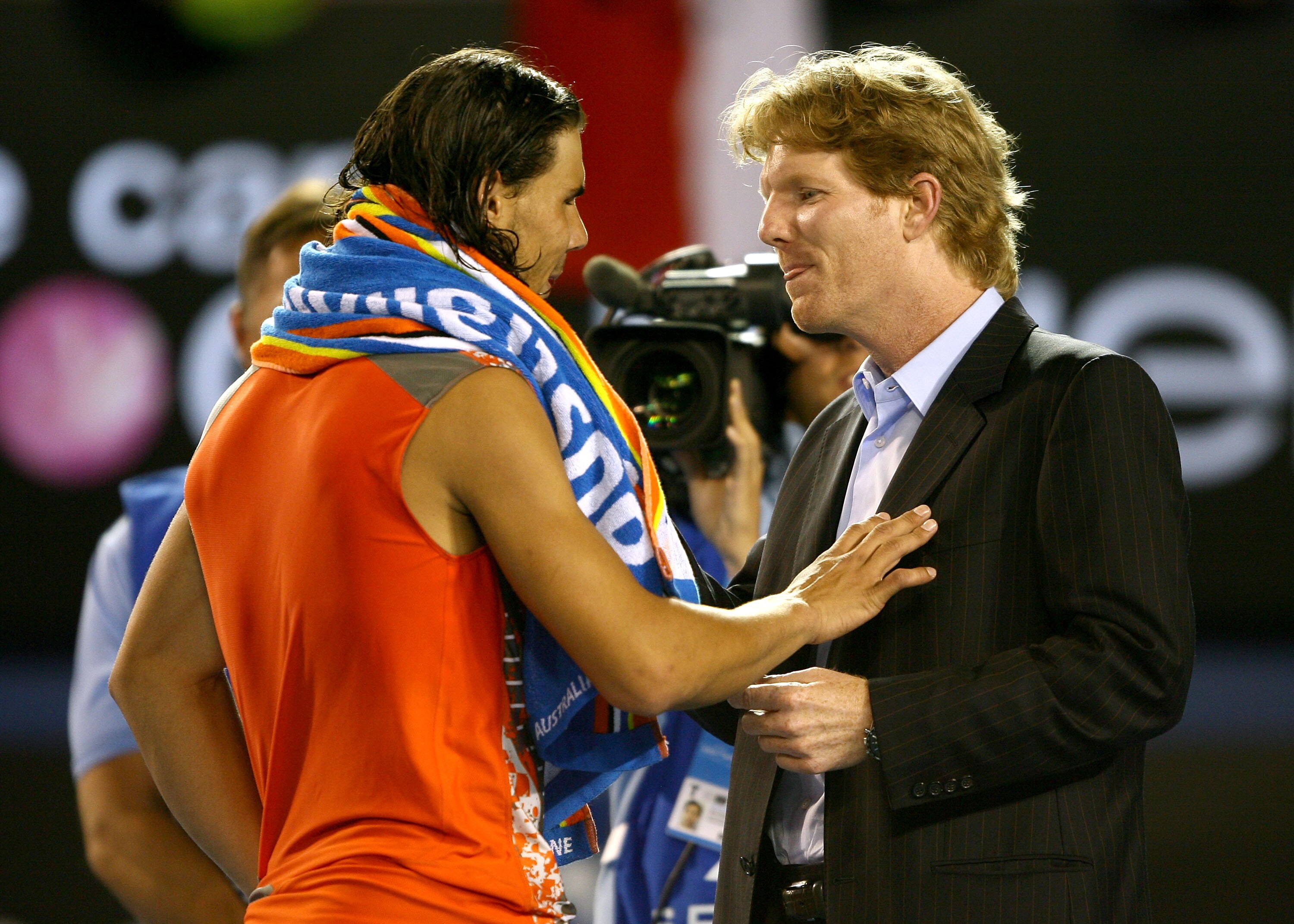 MELBOURNE, AUSTRALIA - JANUARY 20:  Rafael Nadal of Spain is interviewed by Jim Courier after winning his fourth round match against Paul-Henri Mathieu of France on day seven of the Australian Open 2008 at Melbourne Park on January 20, 2008 in Melbourne, 