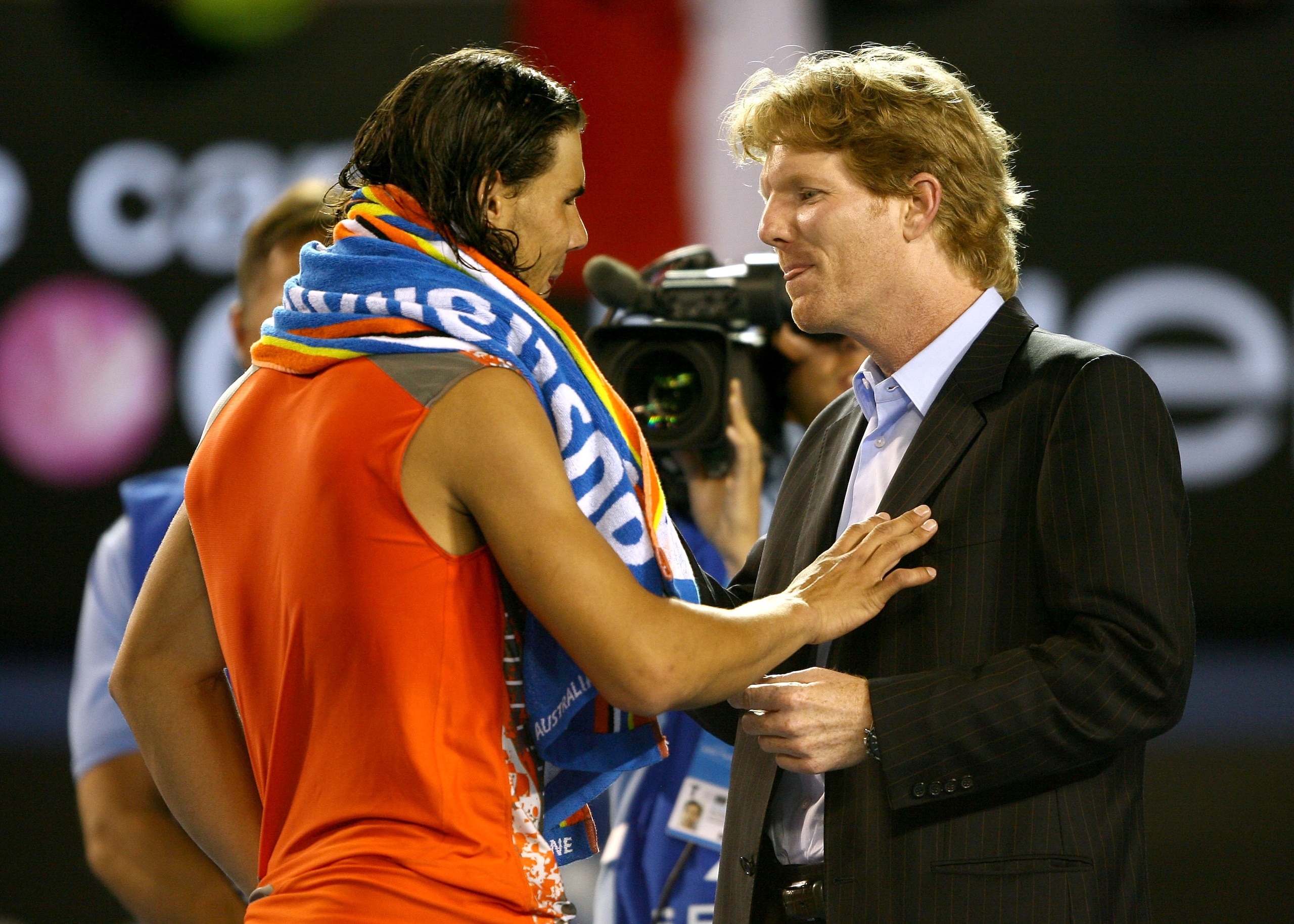 MELBOURNE, AUSTRALIA - JANUARY 20:  Rafael Nadal of Spain is interviewed by Jim Courier after winning his fourth round match against Paul-Henri Mathieu of France on day seven of the Australian Open 2008 at Melbourne Park on January 20, 2008 in Melbourne, 