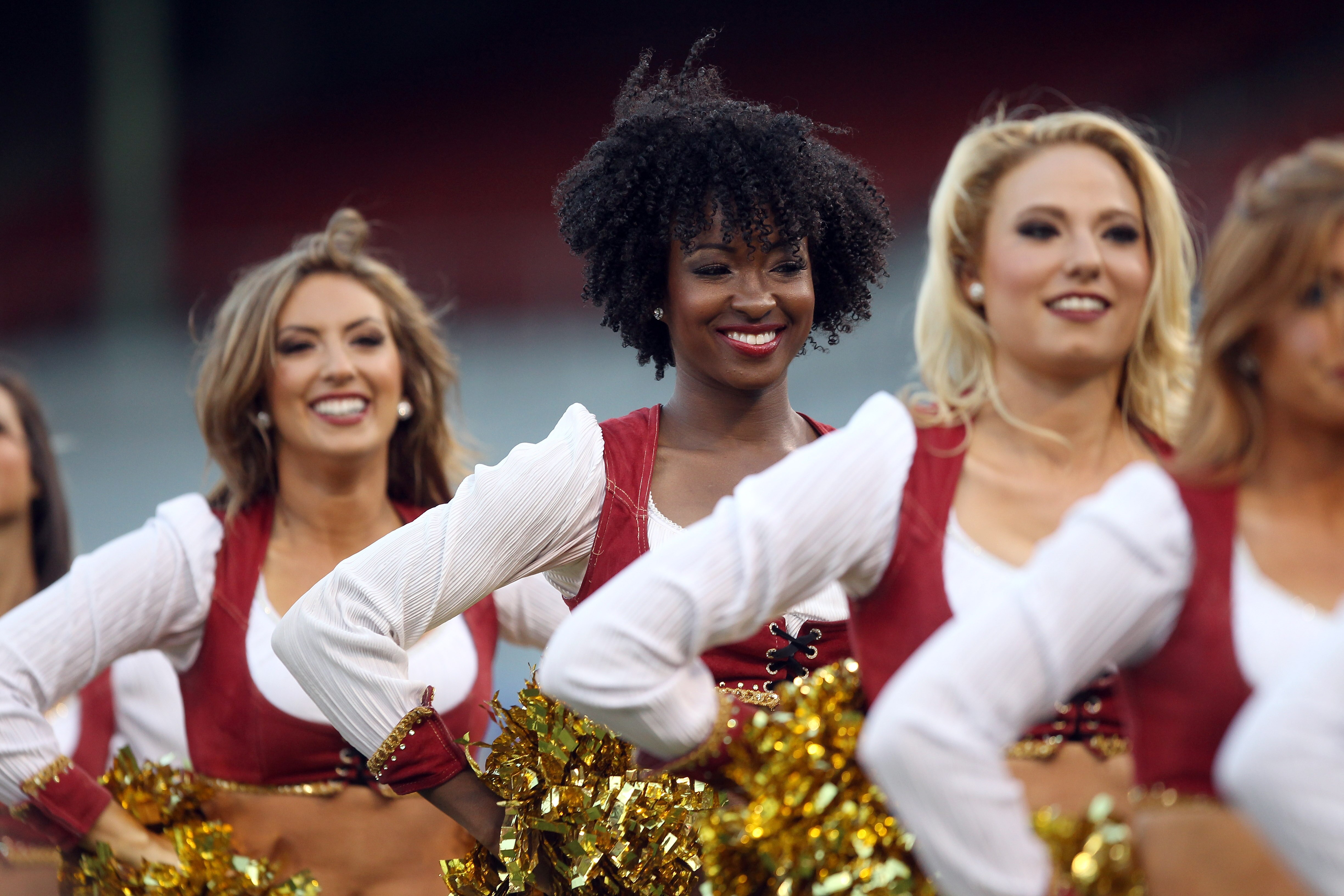 SAN FRANCISCO - SEPTEMBER 02:  The San Francisco 49ers' Gold Rush cheerleaders cheer during their game against the San Diego Chargers at Candlestick Park  on September 2, 2010 in San Francisco, California.  (Photo by Ezra Shaw/Getty Images)