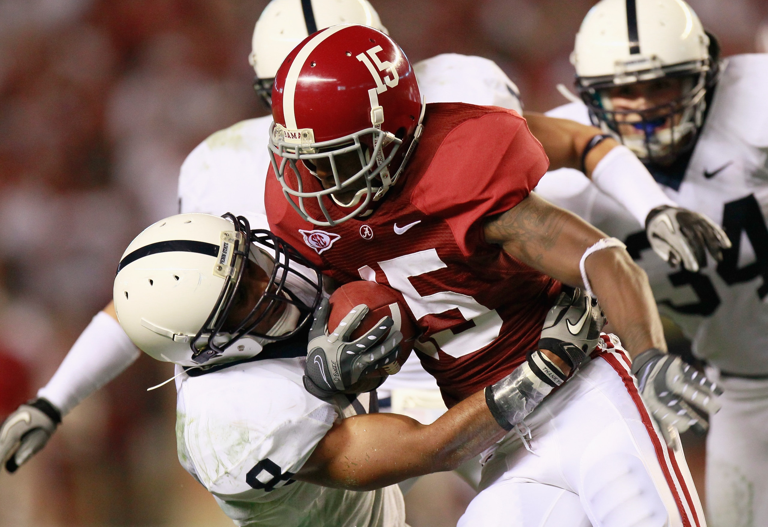 TUSCALOOSA, AL - SEPTEMBER 11:  Darius Hanks #15 of the Alabama Crimson Tide against D'Anton Lynn #8 of the Penn State Nittany Lions at Bryant-Denny Stadium on September 11, 2010 in Tuscaloosa, Alabama.  (Photo by Kevin C. Cox/Getty Images)