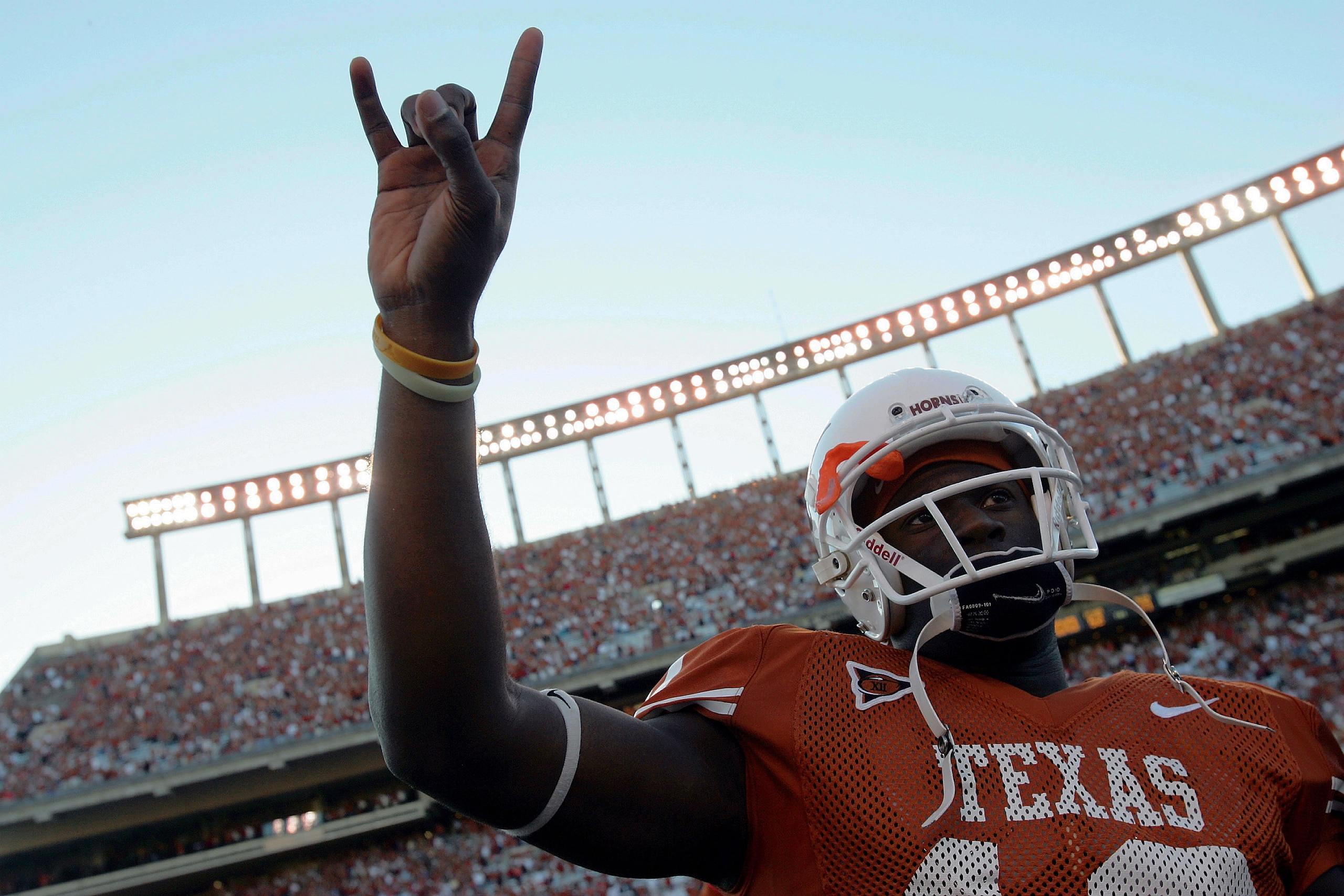 AUSTIN, TX - OCTOBER 22: Quarterback Vince Young #10 of the Texas Longhorns gives the 'Hook 'em Horns' sign after a win against the Texas Tech Red Raiders on October 22, 2005 at Texas Memorial Stadium in Austin, Texas. Texas defeated Texas Tech 52-17. ( AUSTIN, TX - OCTOBER 22: Quarterback Vince Young #10 of the Texas Longhorns gives the 'Hook 'em Horns' sign after a win against the Texas Tech Red Raiders on October 22, 2005 at Texas Memorial Stadium in Austin, Texas. Texas defeated Texas Tech 52-17. (