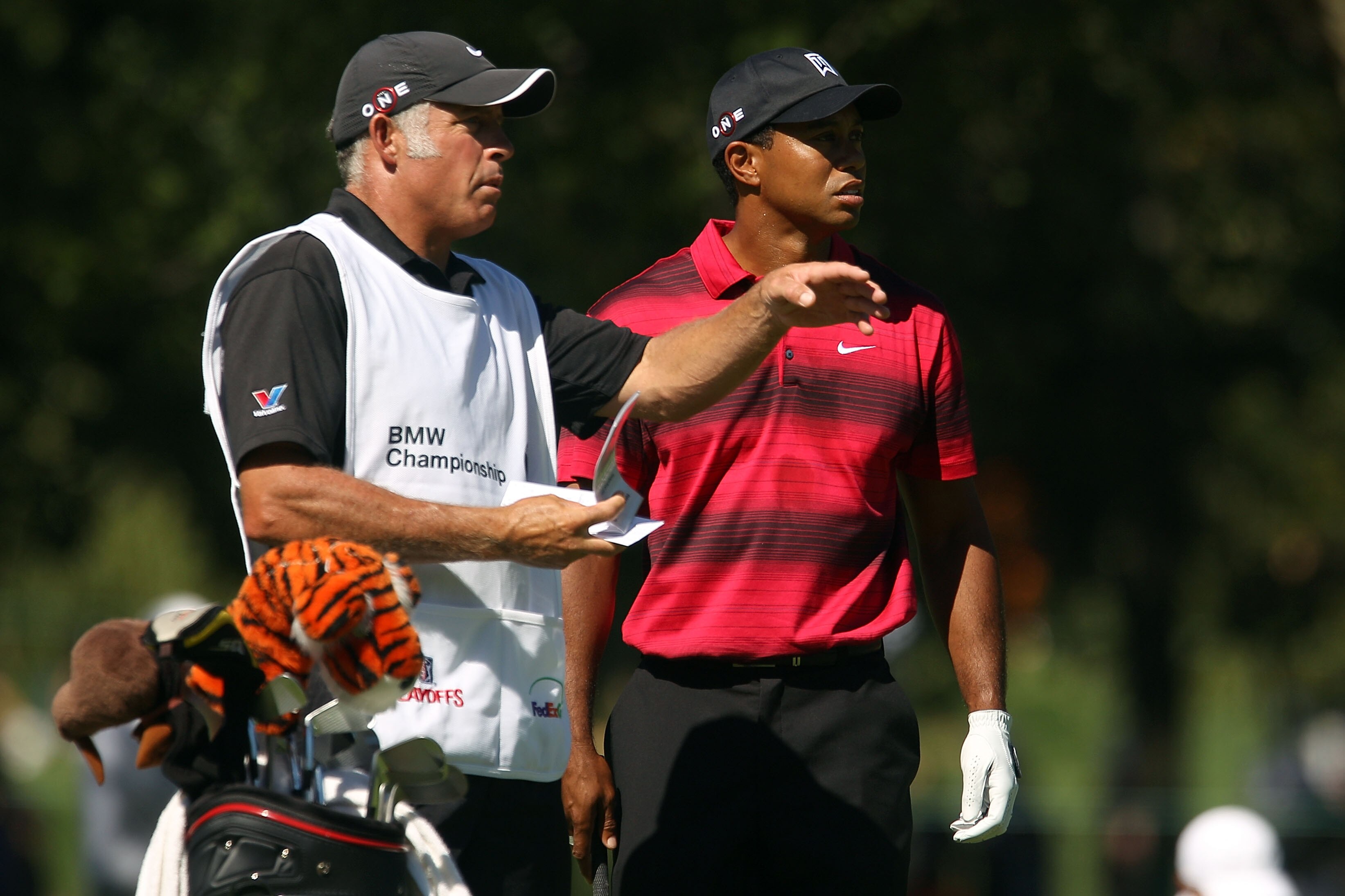 LEMONT, IL - SEPTEMBER 12:  Caddie Steve Williams talks over a shot with Tiger Woods on the third hole during the final round of the BMW Championship at Cog Hill Golf & Country Club on September 12, 2010 in Lemont, Illinois.  (Photo by Scott Halleran/Gett