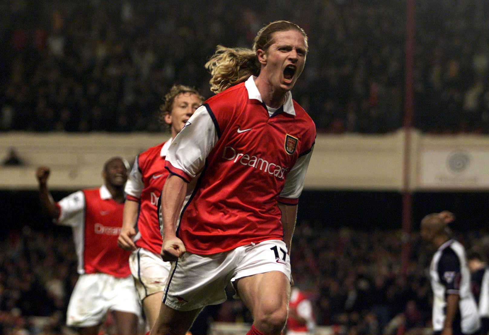2 May 2000:  Emmanuel Petit of Arsenal celebrates scoring the winning goal in the last minute during the match between Arsenal and West Ham United in the FA Carling Premiership at Highbury, London.  Mandatory Credit: Laurence Griffiths/ALLSPORT