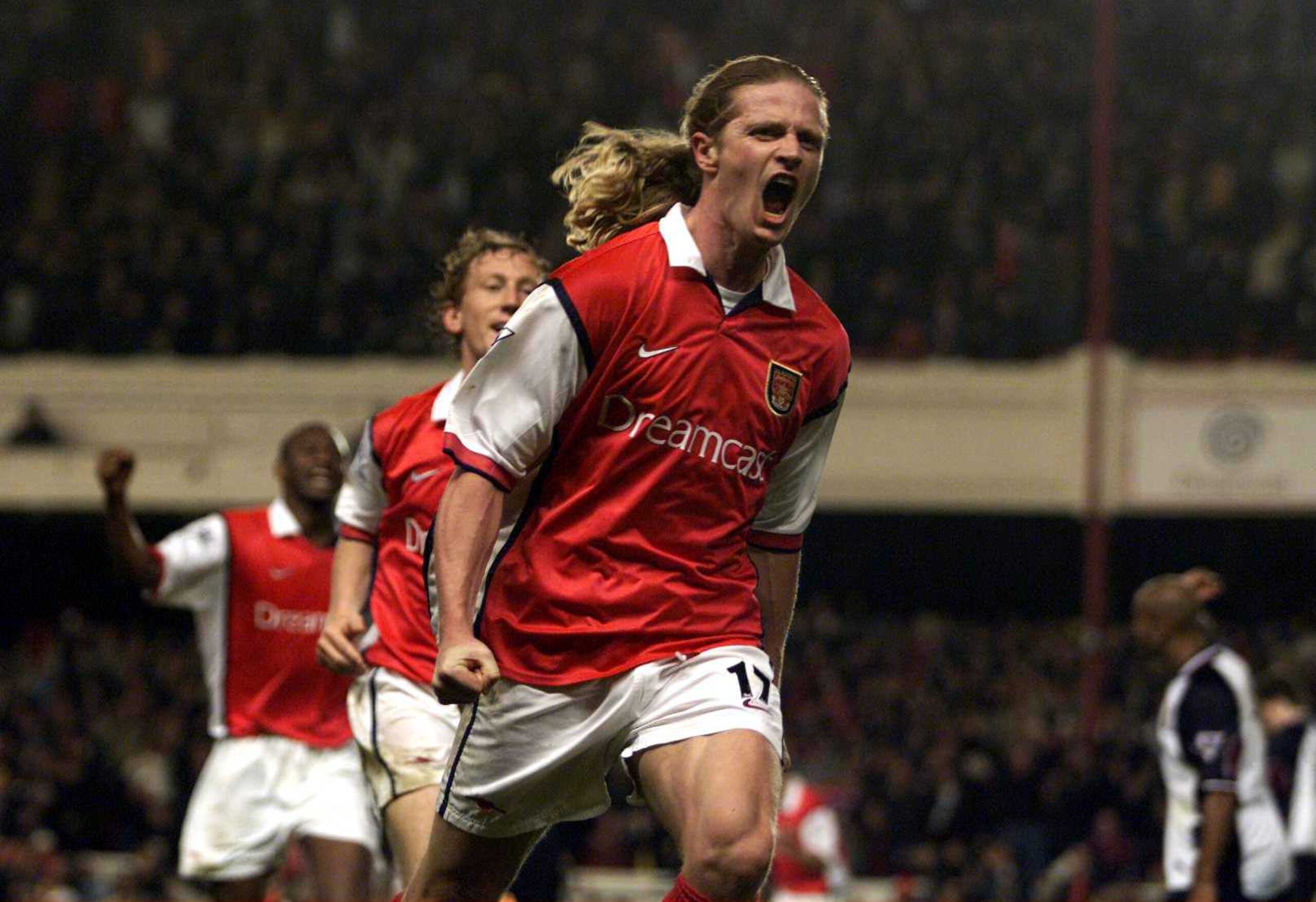 2 May 2000:  Emmanuel Petit of Arsenal celebrates scoring the winning goal in the last minute during the match between Arsenal and West Ham United in the FA Carling Premiership at Highbury, London.  Mandatory Credit: Laurence Griffiths/ALLSPORT