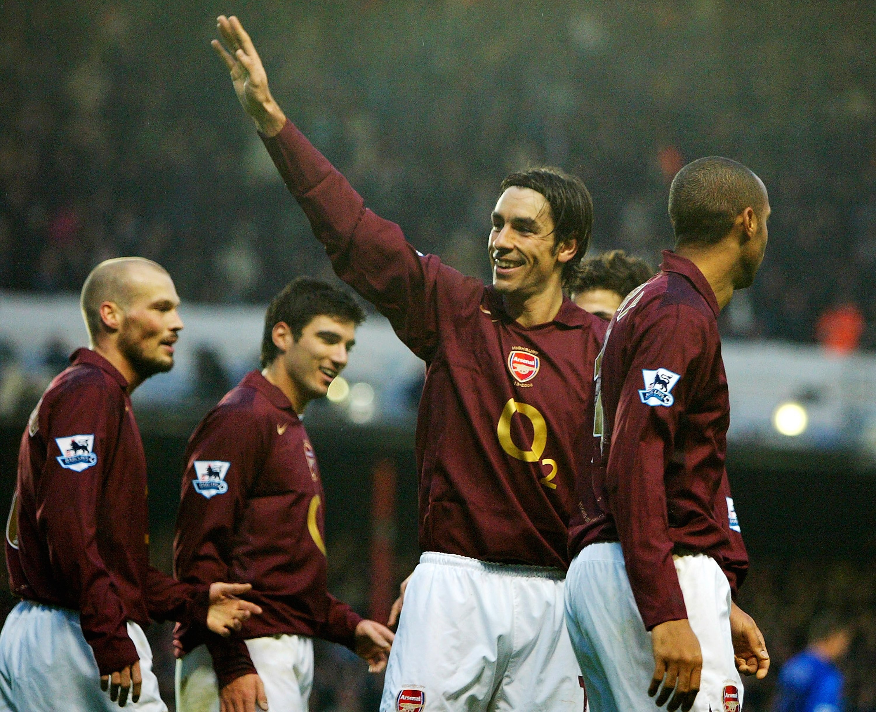 LONDON - JANUARY 14:  Robert Pires of Arsenal is congratulated by team mates after scoring the fourth goal of the game during the Barclays Premiership match between Arsenal and Middlesbrough at Highbury on January 14, 2006 in London, England.  (Photo by R