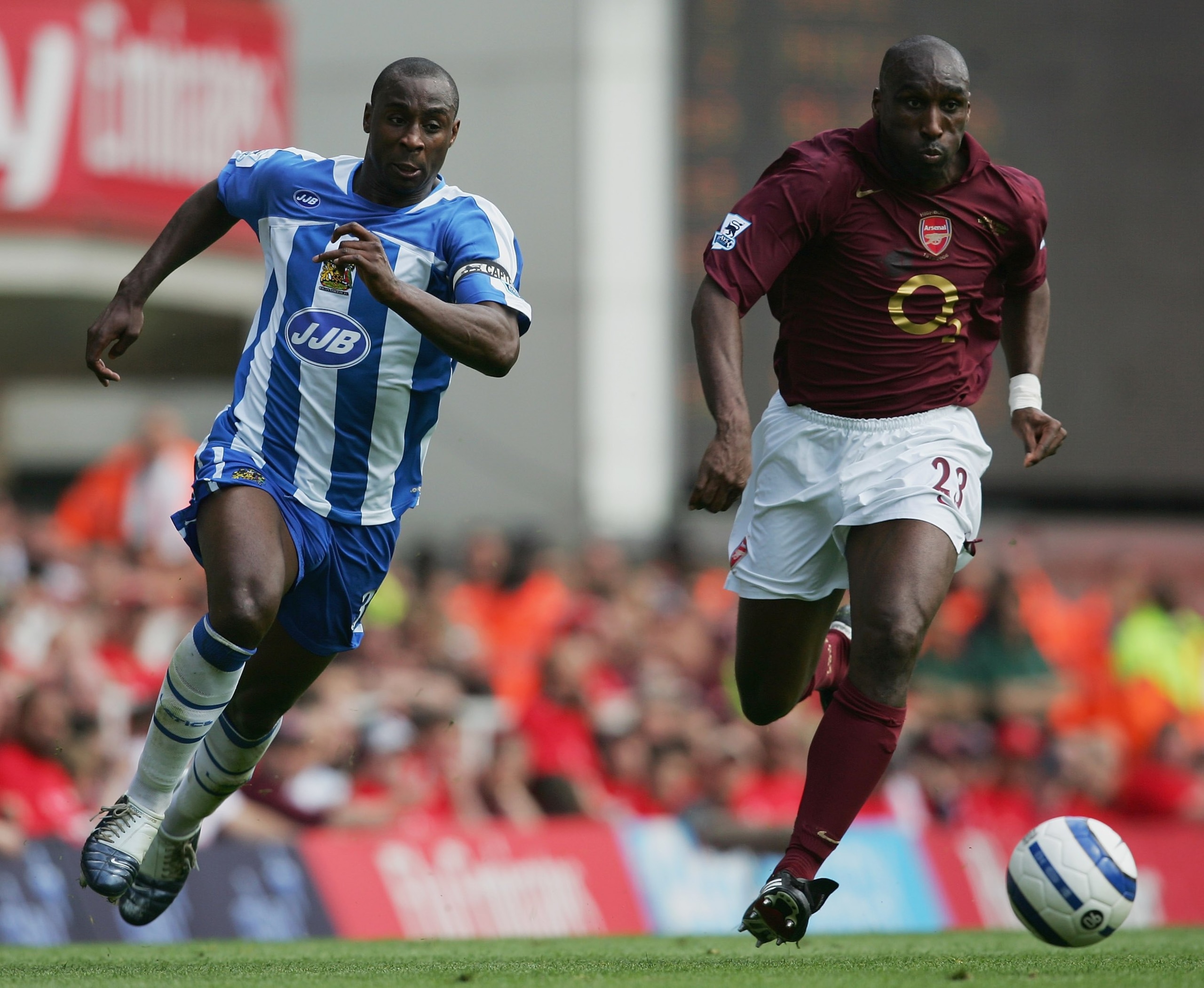 LONDON - MAY 07:  (L-R) Jason Roberts of Wigan Athletic and Sol Campbell of Arsenal during the Barclays Premiership match between Arsenal and Wigan Athletic at Highbury on May 7, 2006 in London, England.  The match was the last to be played at Highbury af