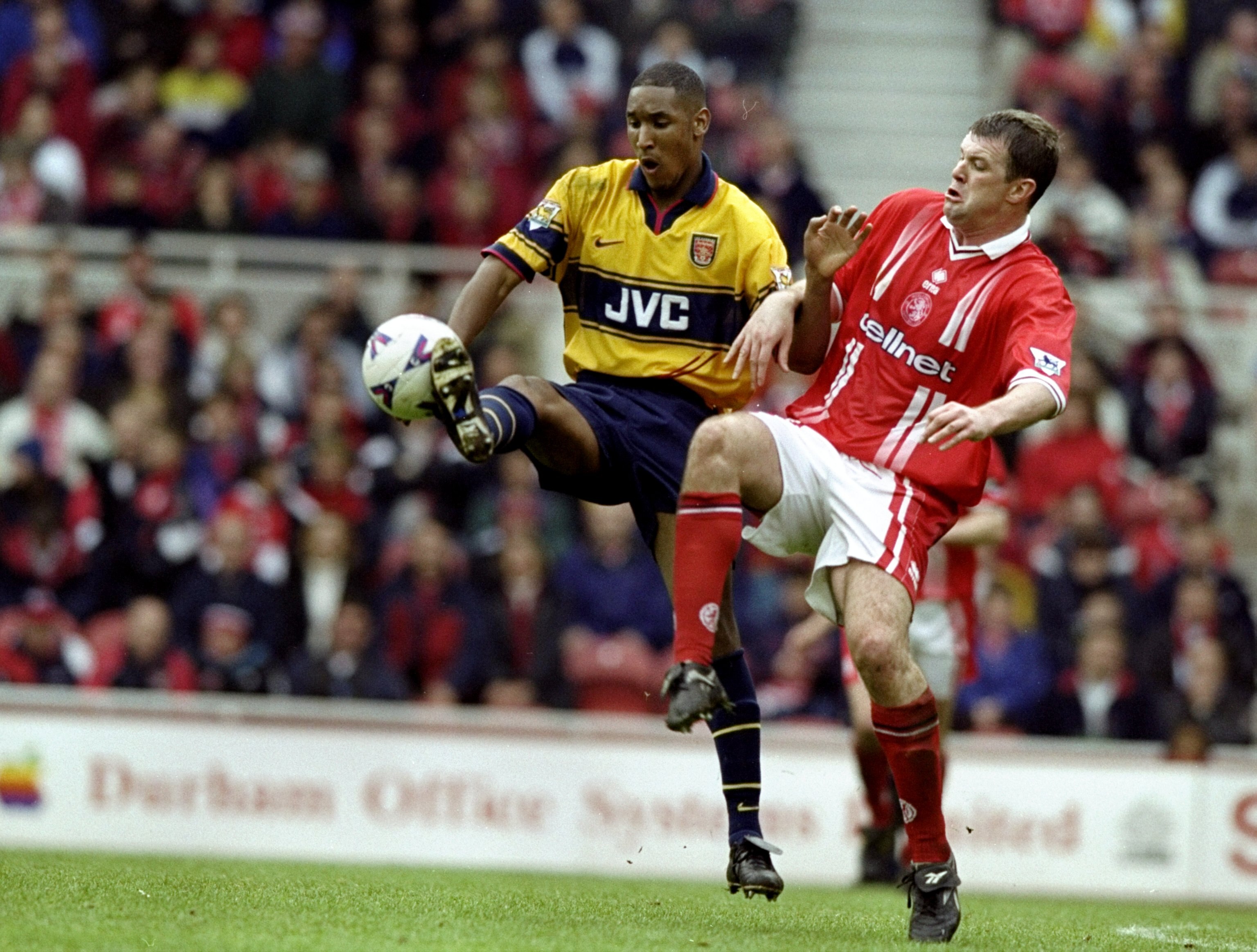24 Apr 1999:  Nicolas Anelka of Arsenal is challenged by Gary Pallister of Middlesbrough in the FA Carling Premiership match at the Riverside Stadium in Middlesbrough, England. Arsenal won 6-1. \ Mandatory Credit: Clive Brunskill /Allsport
