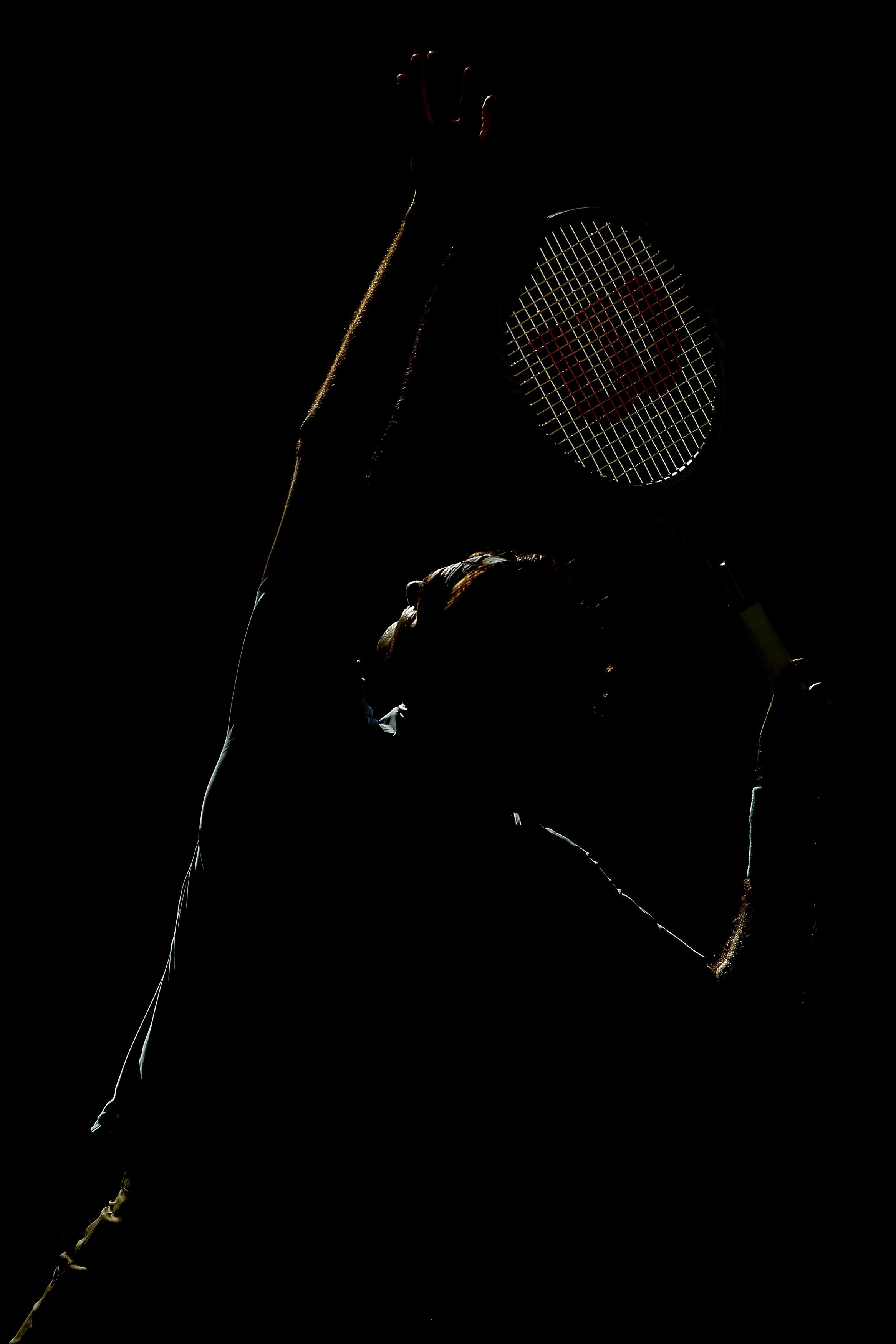 NEW YORK - SEPTEMBER 11:  Roger Federer of Switzerland serves against Novak Djokovic of Serbia during his men's singles semifinal match on day thirteen of the 2010 U.S. Open at the USTA Billie Jean King National Tennis Center on September 11, 2010 in the
