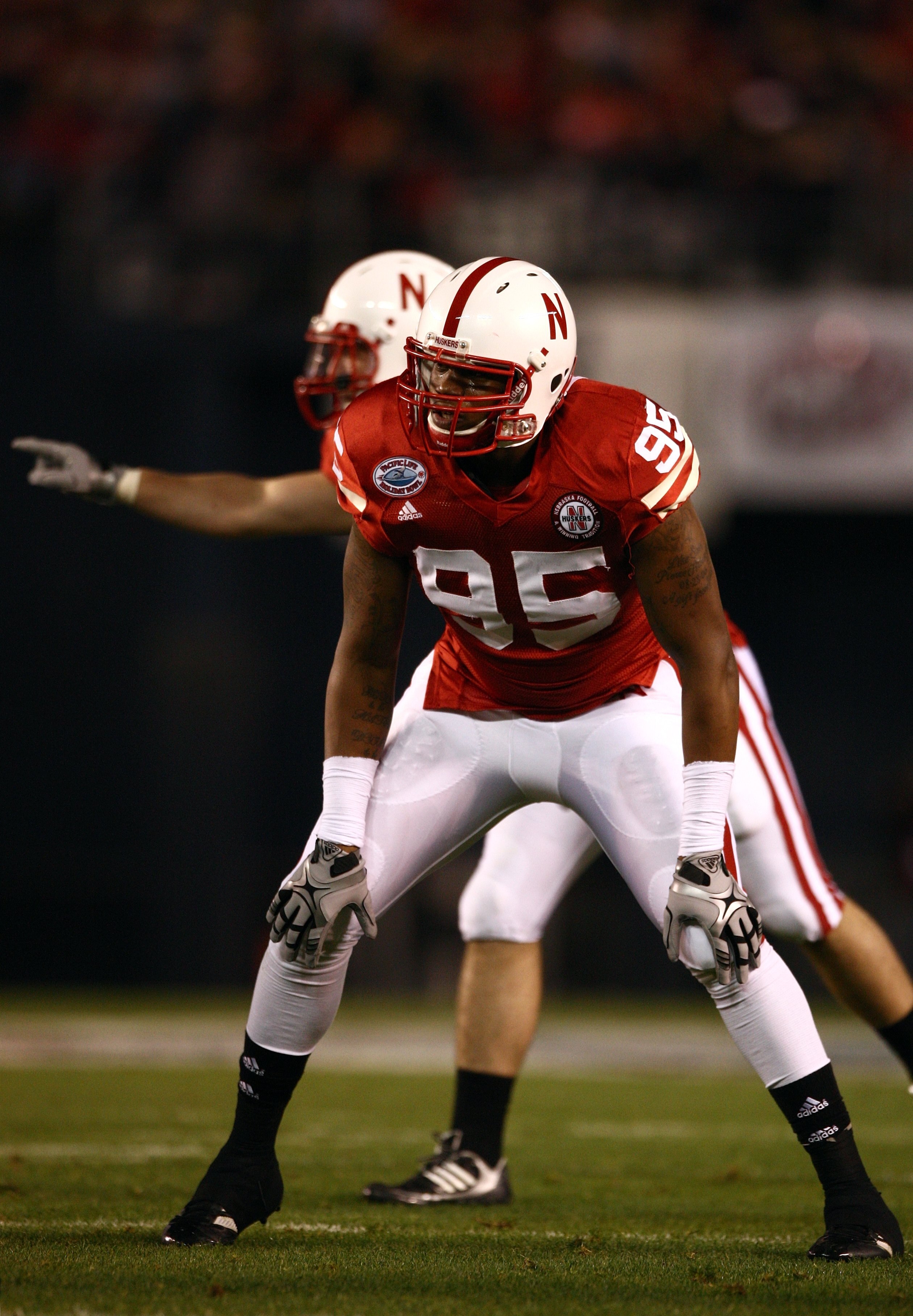 SAN DIEGO - DECEMBER 30:  Pierre Allen #95 of the University of Nebraska Cornhuskers looks on during the Pacific Life Holiday Bowl against University of Arizona Wildcats on December 30, 2009 at Qualcomm Stadium in San Diego, California. The Cornhuskers de