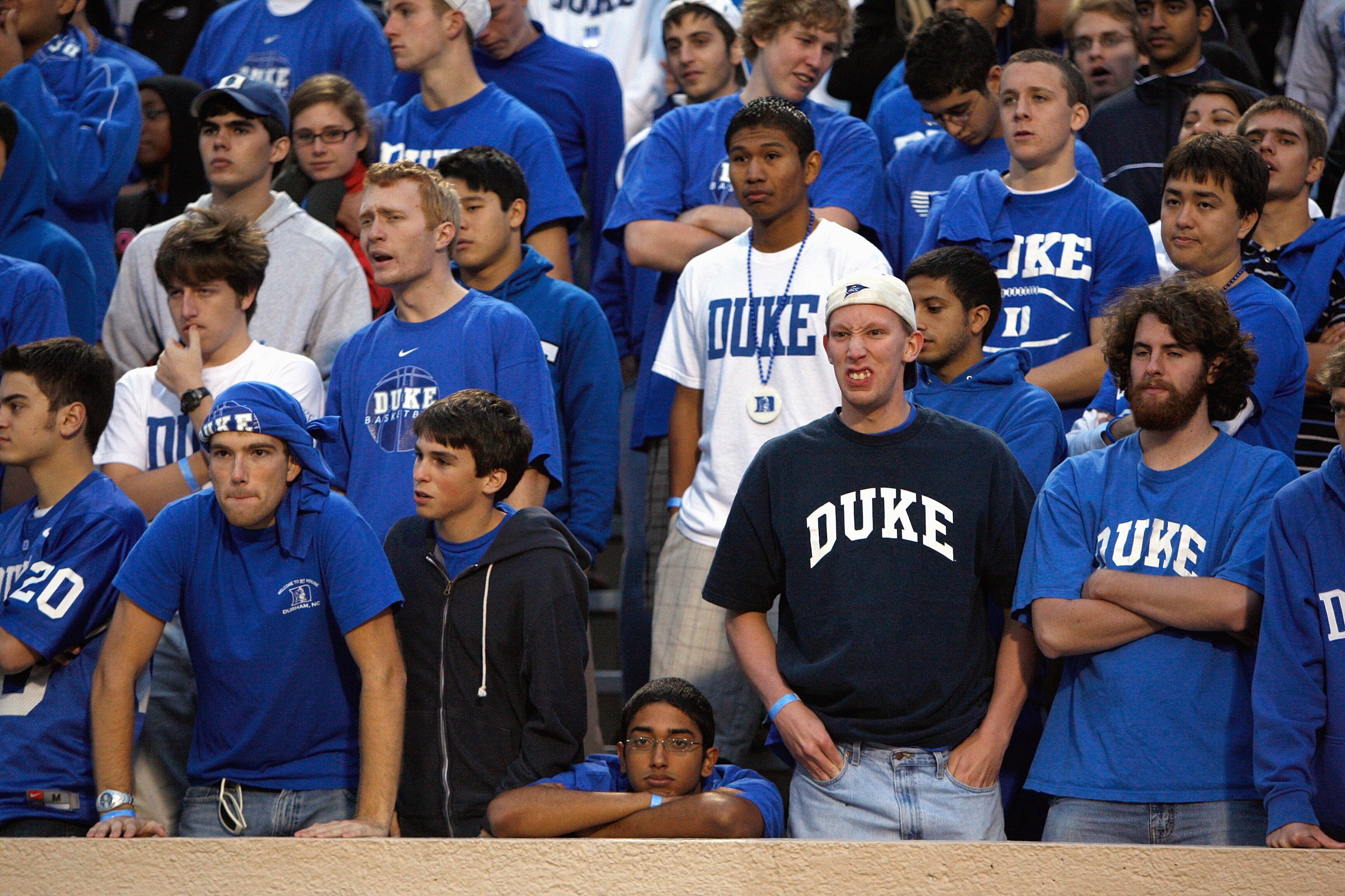 DURHAM, NC - OCTOBER 18: Fans of the Duke Blue Devils watch the action during the game against the Miami Hurricanes at Wallace Wade Stadium on October 18, 2008 in Durham, North Carolina. (Photo by Kevin C. Cox/Getty Images) DURHAM, NC - OCTOBER 18: Fans of the Duke Blue Devils watch the action during the game against the Miami Hurricanes at Wallace Wade Stadium on October 18, 2008 in Durham, North Carolina. (Photo by Kevin C. Cox/Getty Images)