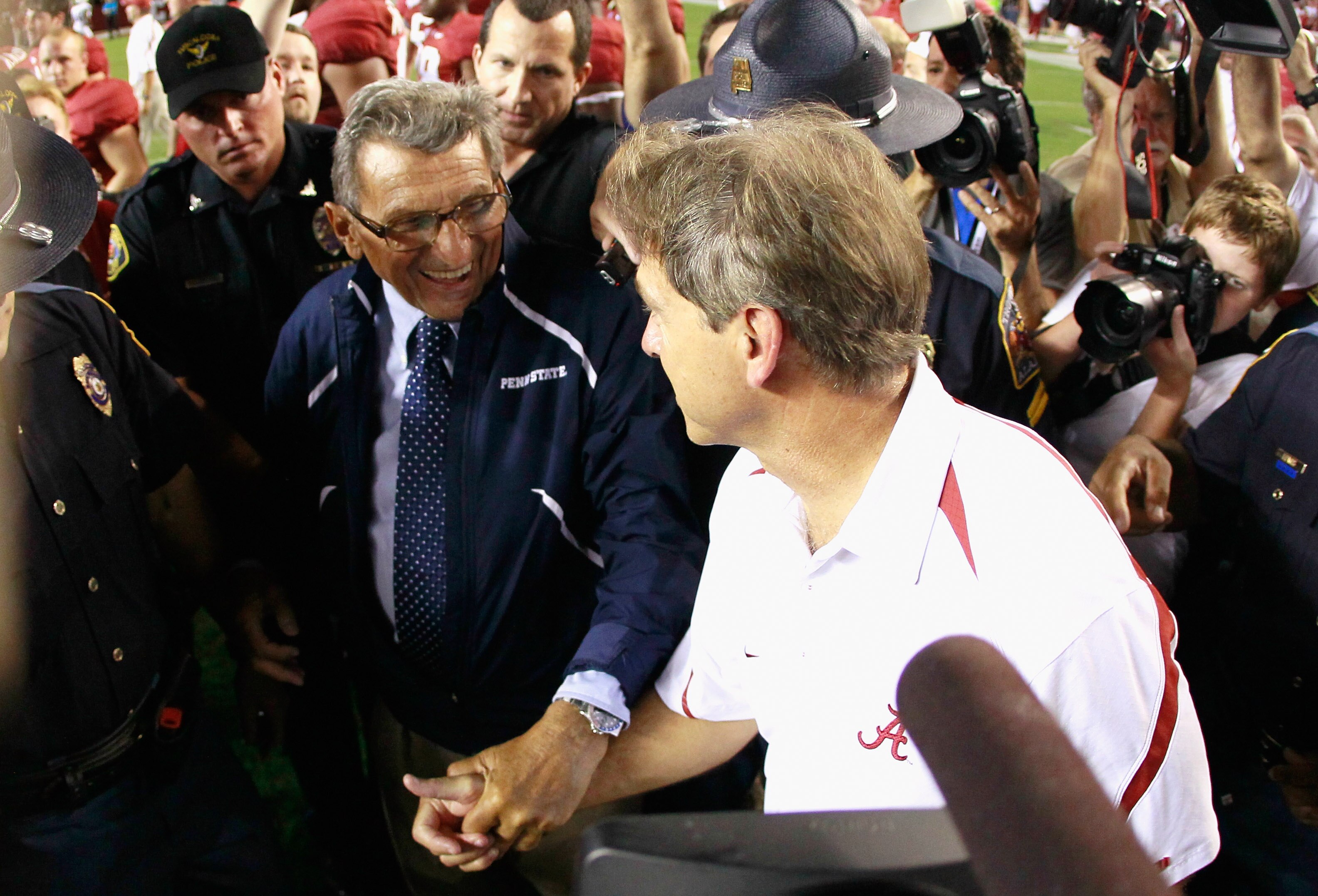 TUSCALOOSA, AL - SEPTEMBER 11: Head coach Joe Paterno of the Penn State Nittany Lions congratulates head coach Nick Saban of the Alabama Crimson Tide during after their 24-3 loss at Bryant-Denny Stadium on September 11, 2010 in Tuscaloosa, Alabama. (Pho TUSCALOOSA, AL - SEPTEMBER 11: Head coach Joe Paterno of the Penn State Nittany Lions congratulates head coach Nick Saban of the Alabama Crimson Tide during after their 24-3 loss at Bryant-Denny Stadium on September 11, 2010 in Tuscaloosa, Alabama. (Pho
