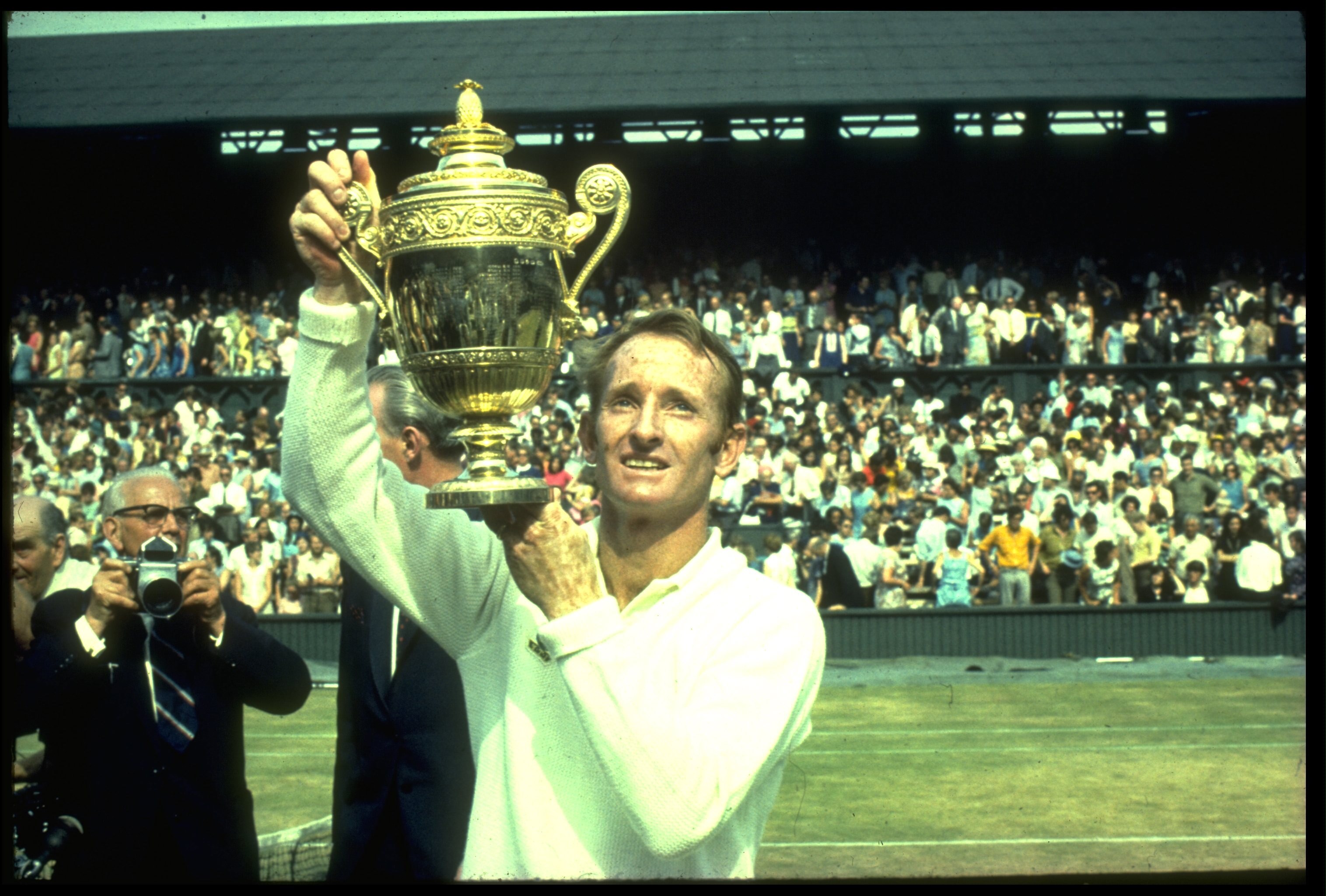 JUL 1969:  ROD LAVER OF AUSTRALIA LIFTS THE TROPHY AFTER WINNING THE MENS SINGLES TITLE AT THE 1969 WIMBLEDON TENNIS CHAMPIONSHIPS. LAVER DEFEATED JOHN NEWCOMBE OF AUSTRALIA 6-4, 5-7, 6-4, 6-4.