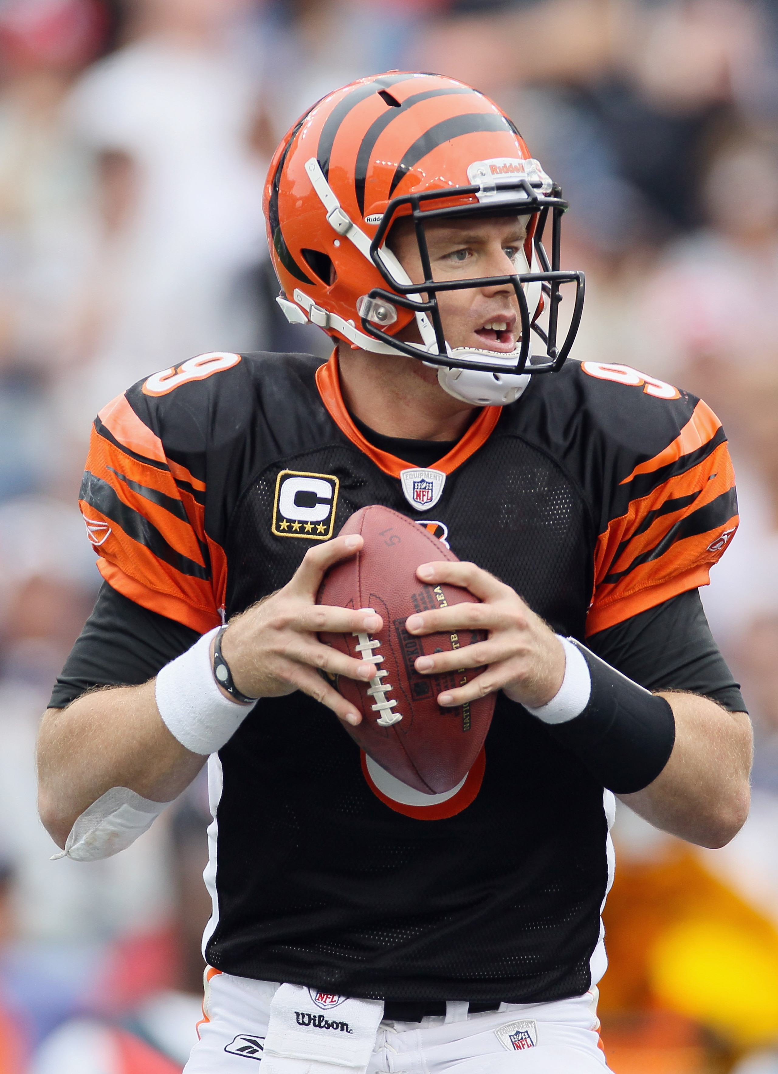 FOXBORO, MA - SEPTEMBER 12:  Carson Palmer #9 of the Cincinnati Bengals looks to pass against the New England Patriots during the NFL season opener on September 12, 2010 at Gillette Stadium in Foxboro, Massachusetts. The Patriots defeated the Bengals 38-2