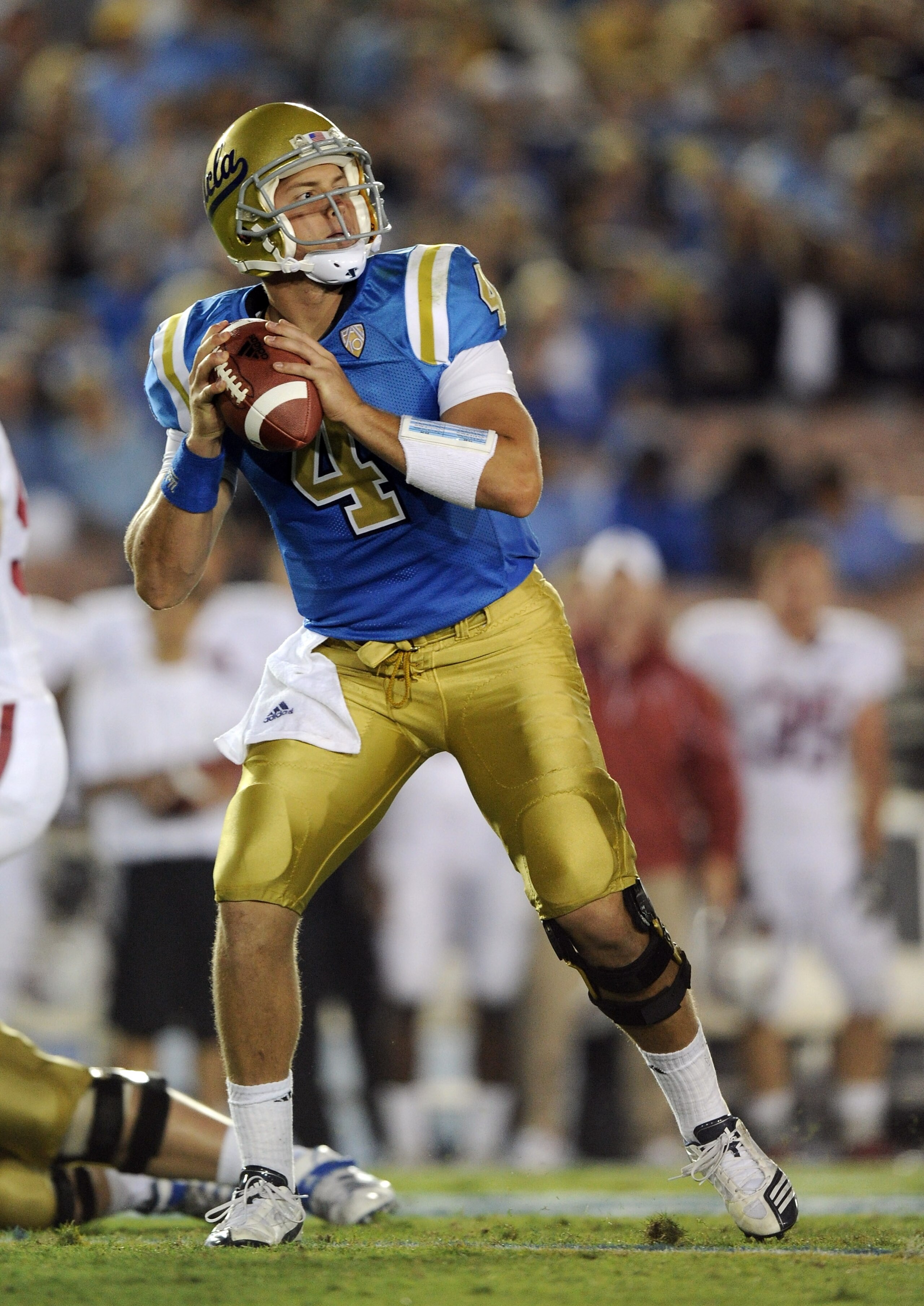PASADENA, CA - SEPTEMBER 11:  Kevin Prince #4 of UCLA prepares to throw against Stanford during the first quarter at Rose Bowl on September 11, 2010 in Pasadena, California.  (Photo by Harry How/Getty Images)