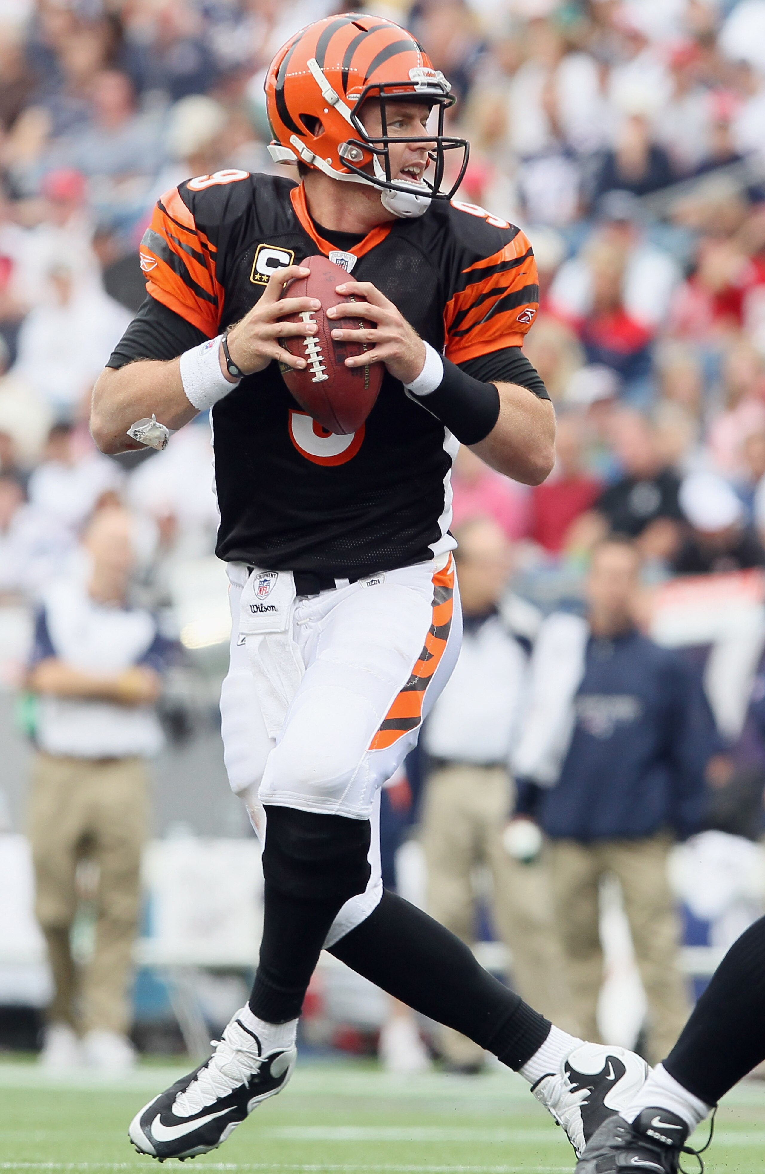 FOXBORO, MA - SEPTEMBER 12: Carson Palmer #9 of the Cincinnati Bengals looks to pass against the New England Patriots during the NFL season opener on September 12, 2010 at Gillette Stadium in Foxboro, Massachusetts. The Patriots defeated the Bengals 38-2 FOXBORO, MA - SEPTEMBER 12: Carson Palmer #9 of the Cincinnati Bengals looks to pass against the New England Patriots during the NFL season opener on September 12, 2010 at Gillette Stadium in Foxboro, Massachusetts. The Patriots defeated the Bengals 38-2