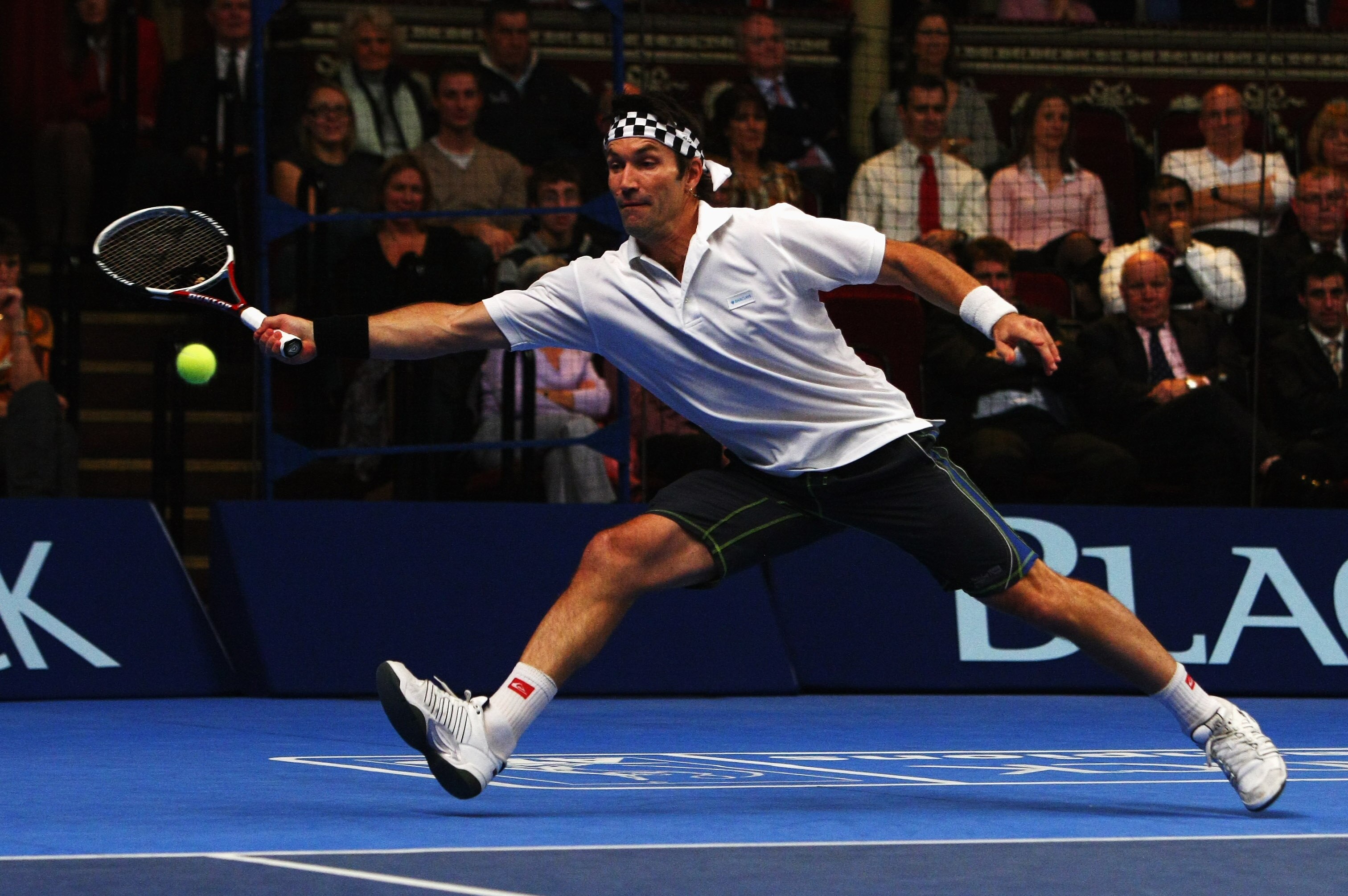 LONDON - DECEMBER 06:  Pat Cash in action during his match against John McEnroe in the BlackRock Masters at the Royal Albert Hall on December 6, 2007 in London, England  (Photo by Clive Rose/Getty Images)