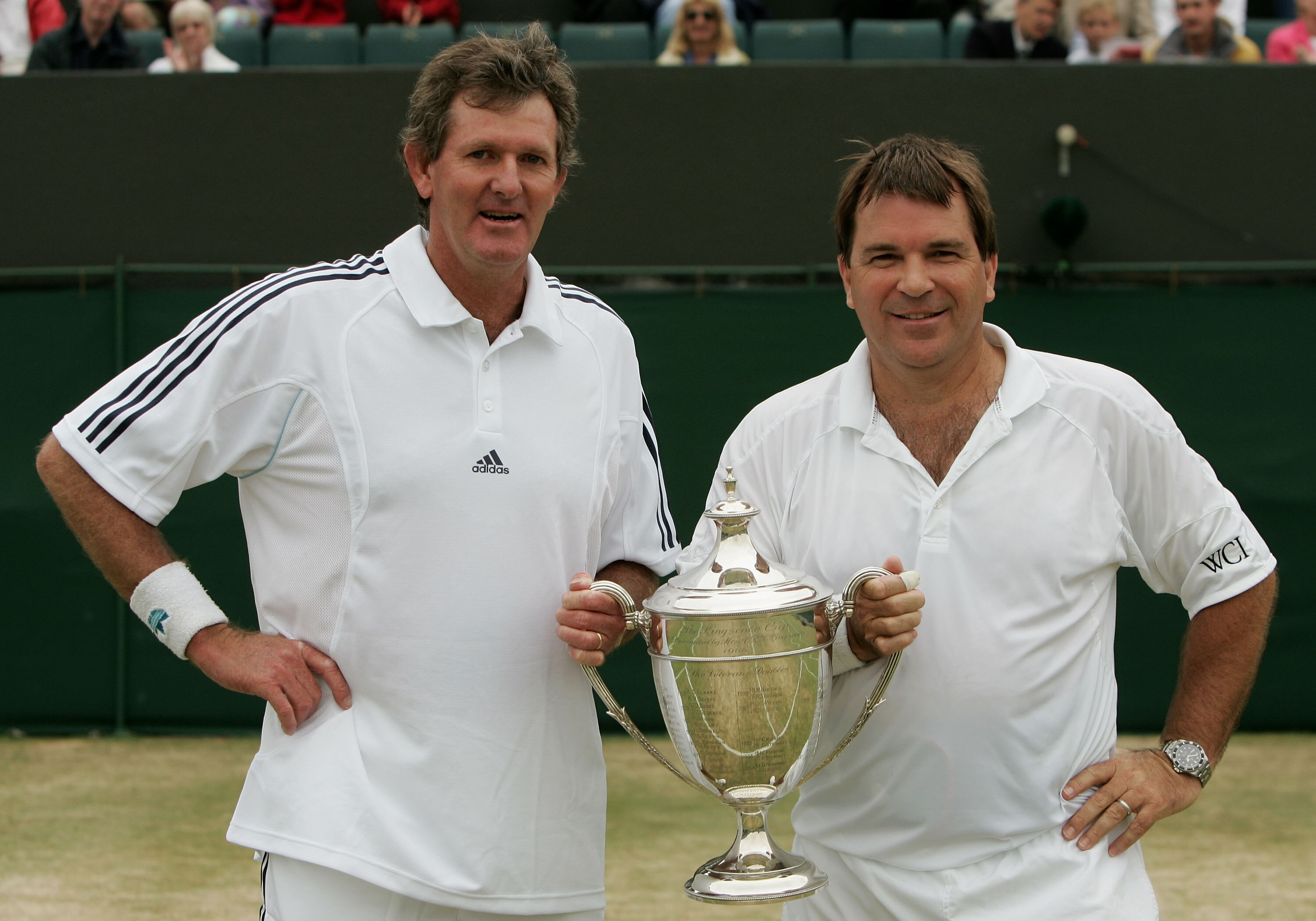 LONDON - JULY 03:  Kevin Curren of South Africa (L) and Johan Kriek of USA celebrate with the trophy after defeating Peter McNamara of Austria and Paul McNamee of Australia in the Over 45 Doubles final during the thirteenth day of the Wimbledon Lawn Tenni