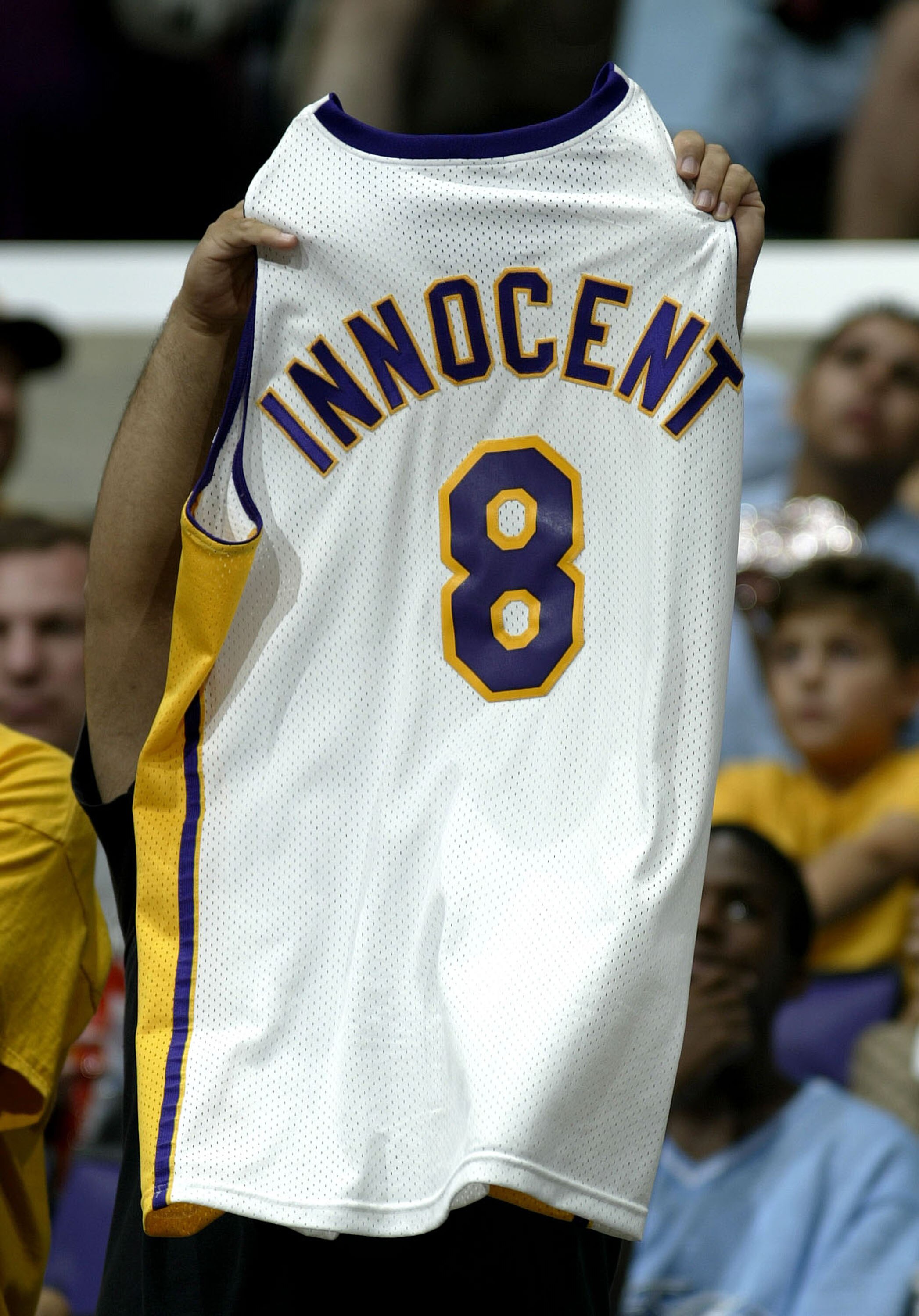 LOS ANGELES - OCTOBER 17:  Fans of Kobe Bryant #8 of the Los Angeles Lakers show their support during the Lakers Shootout against the Phoenix Suns on October 17, 2003 at Staples Center in Los Angeles, California.  NOTE TO USER: User expressly acknowledges