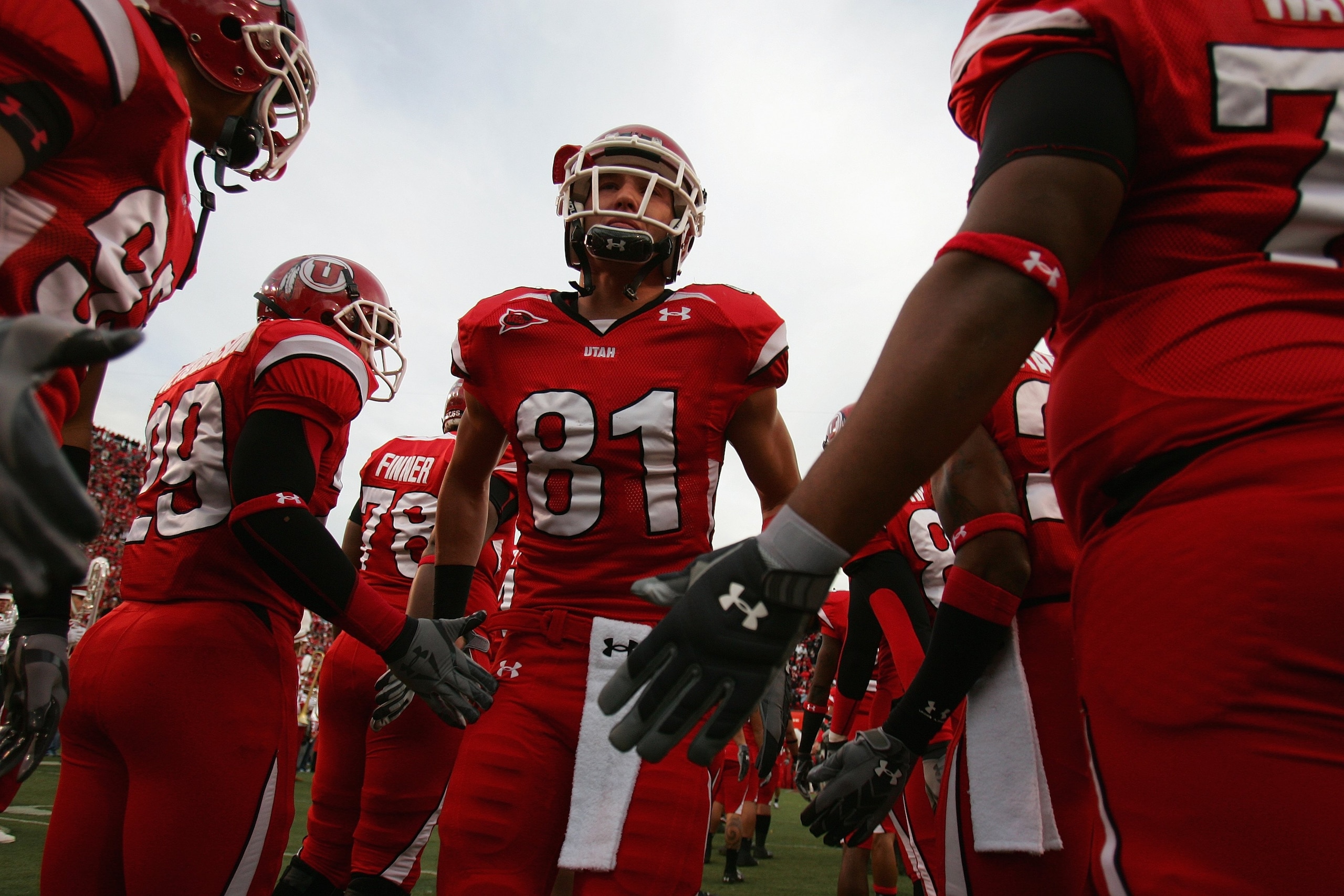 SALT LAKE CITY, UT - NOVEMBER 22:  Bradon Godfrey #81 of the Utah Utes runs onto the field before the game against the BYU Cougars at Rice-Eccles Stadium on November 22, 2008 in Salt Lake City, Utah. (Photo by Jonathan Ferrey/Getty Images)