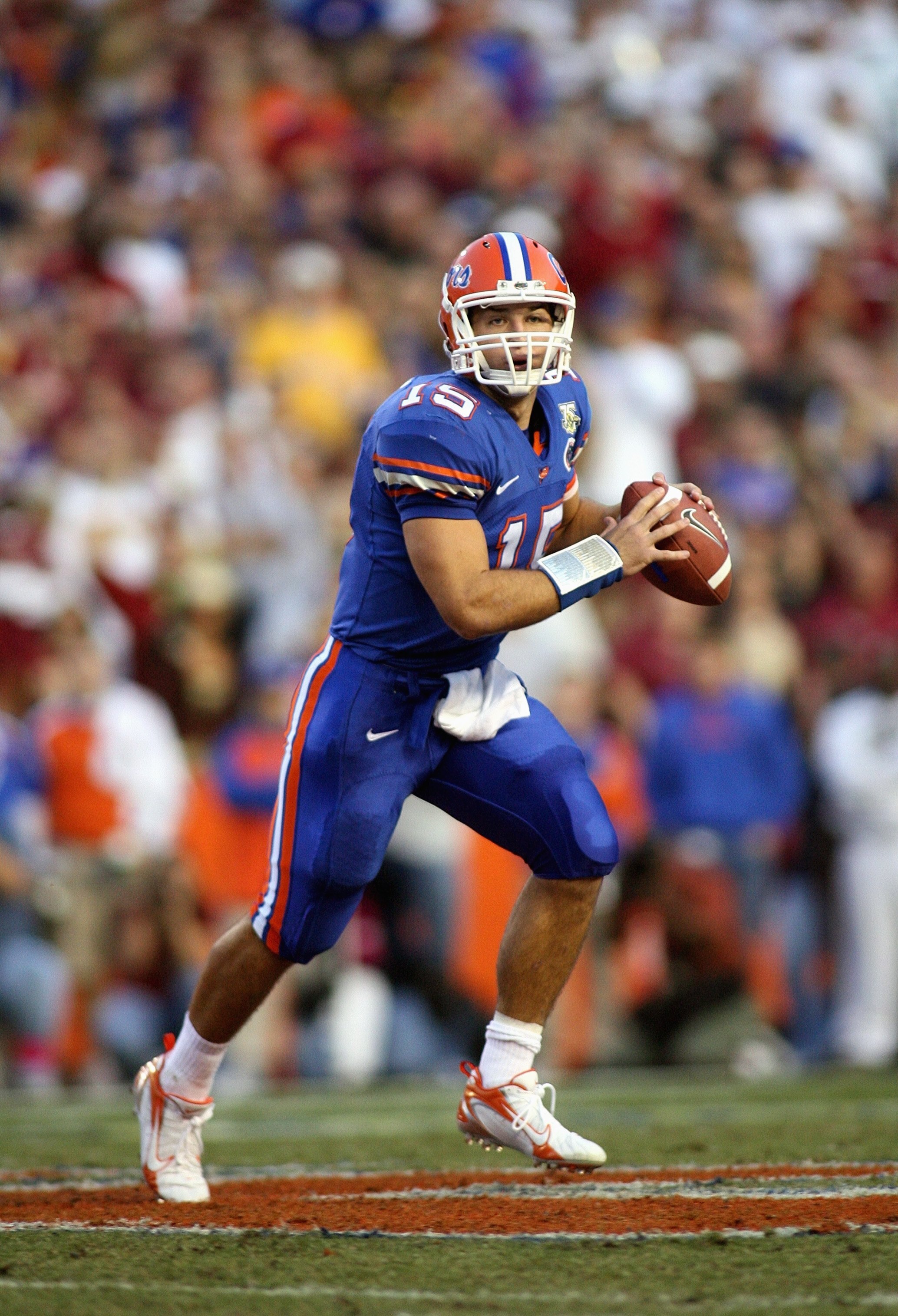 GAINESVILLE, FL - NOVEMBER 24: Quarterback Tim Tebow #15 of the Florida Gators rolls out against the Florida State Seminoles at Ben Hill Griffin Stadium November 24, 2007 in Gainesville, Florida. (Photo by Marc Serota/Getty Images)