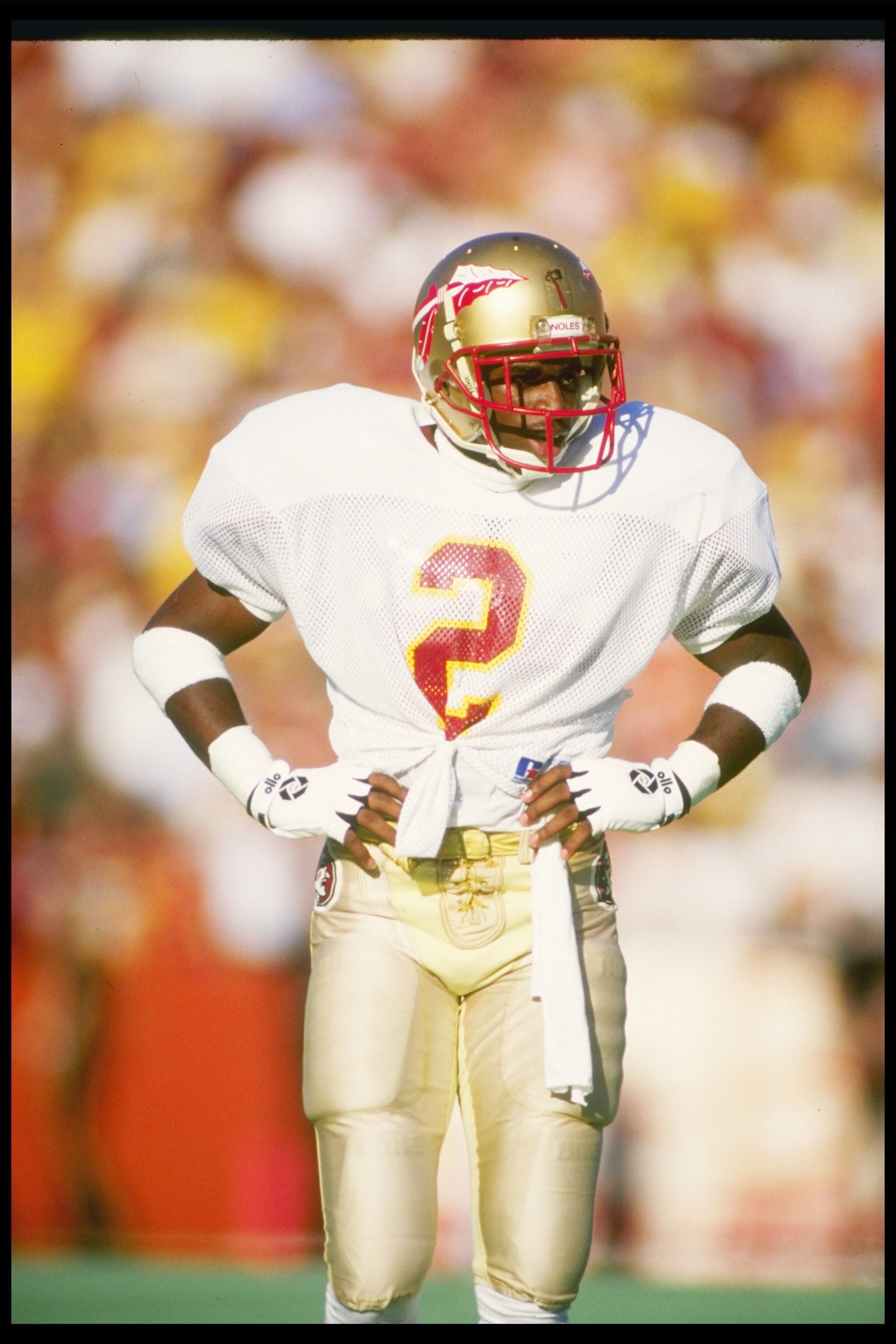 28 Nov 1987:  Cornerback Deion Sanders of the Florida State Seminoles stands on the field during a game against the Florida Gators at Florida Field in Gainesville, Florida.  Florida State won the game 28-14. Mandatory Credit: Allen Dean Steele  /Allsport