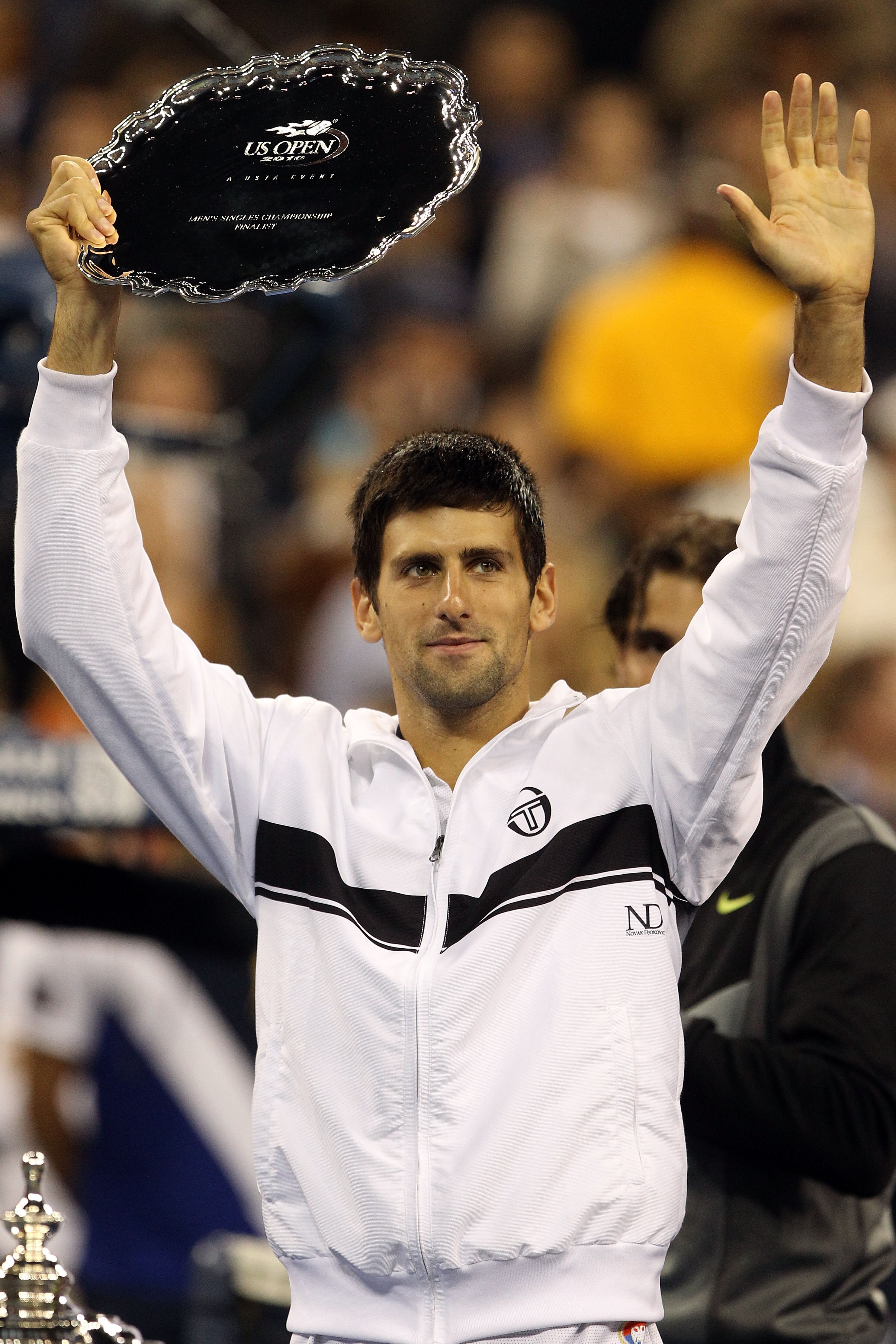 NEW YORK - SEPTEMBER 13:  Runner up Novak Djokovic of Serbia celebrates with his trophy after being defeated by Rafael Nadal of Spain during their men's singles final on day fifteen of the 2010 U.S. Open at the USTA Billie Jean King National Tennis Center
