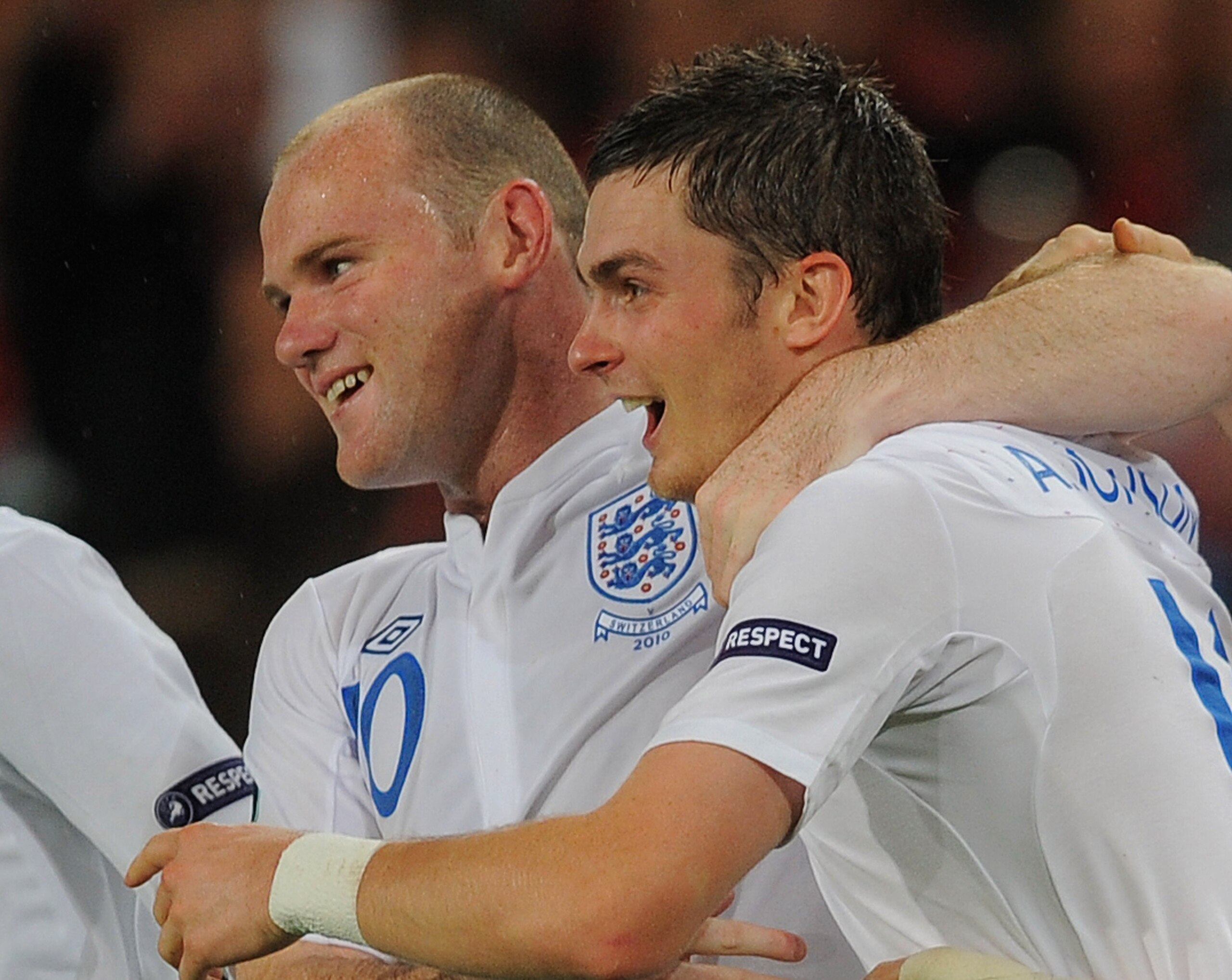 BASEL, SWITZERLAND - SEPTEMBER 07:  BASEL, SWITZERLAND - SEPTEMBER 07 Adam Johnson of England celebrates scoring with Wayne Rooney during the EURO 2012 Group G qualifier between Switzerland and England at St Jakob Park on September 7, 2010 in Basel, Switz