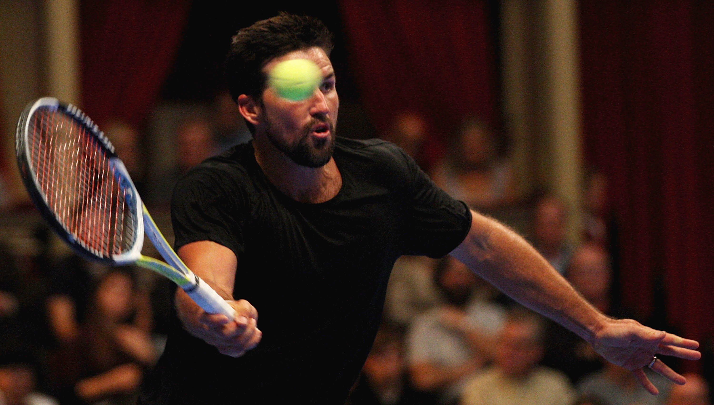 LONDON, ENGLAND - DECEMBER 06:  Pat Rafter of Australia plays a forehand during the Singles Final against Stefan Edberg of Sweden during day six of the AEGON Masters Tennis at the Royal Albert Hall on December 6, 2009 in London, England.  (Photo by Hamish