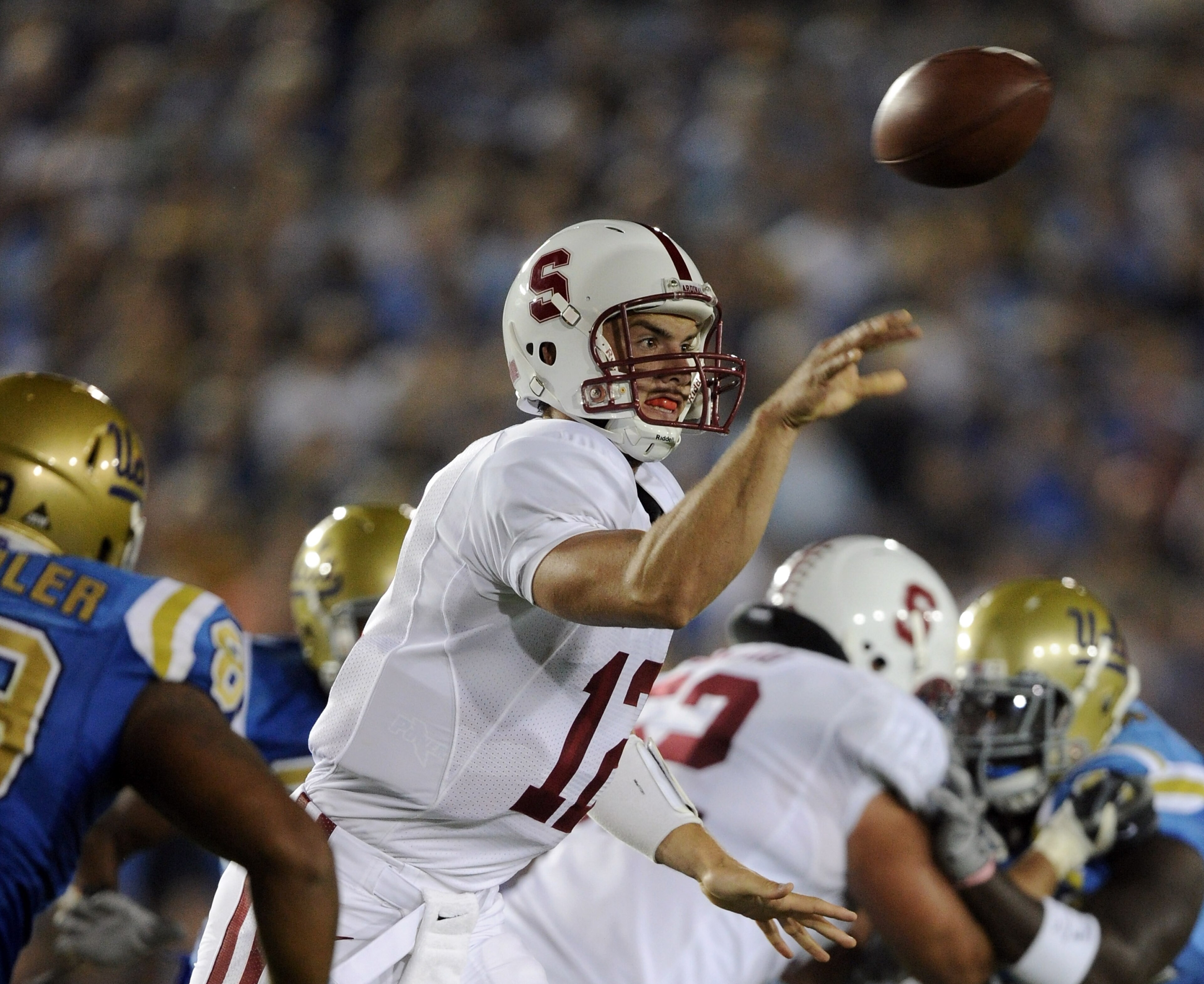 PASADENA, CA - SEPTEMBER 11:  Andrew Luck #12 of Stanford passes in the pocket against UCLA during the first quarter at Rose Bowl on September 11, 2010 in Pasadena, California.  (Photo by Harry How/Getty Images)