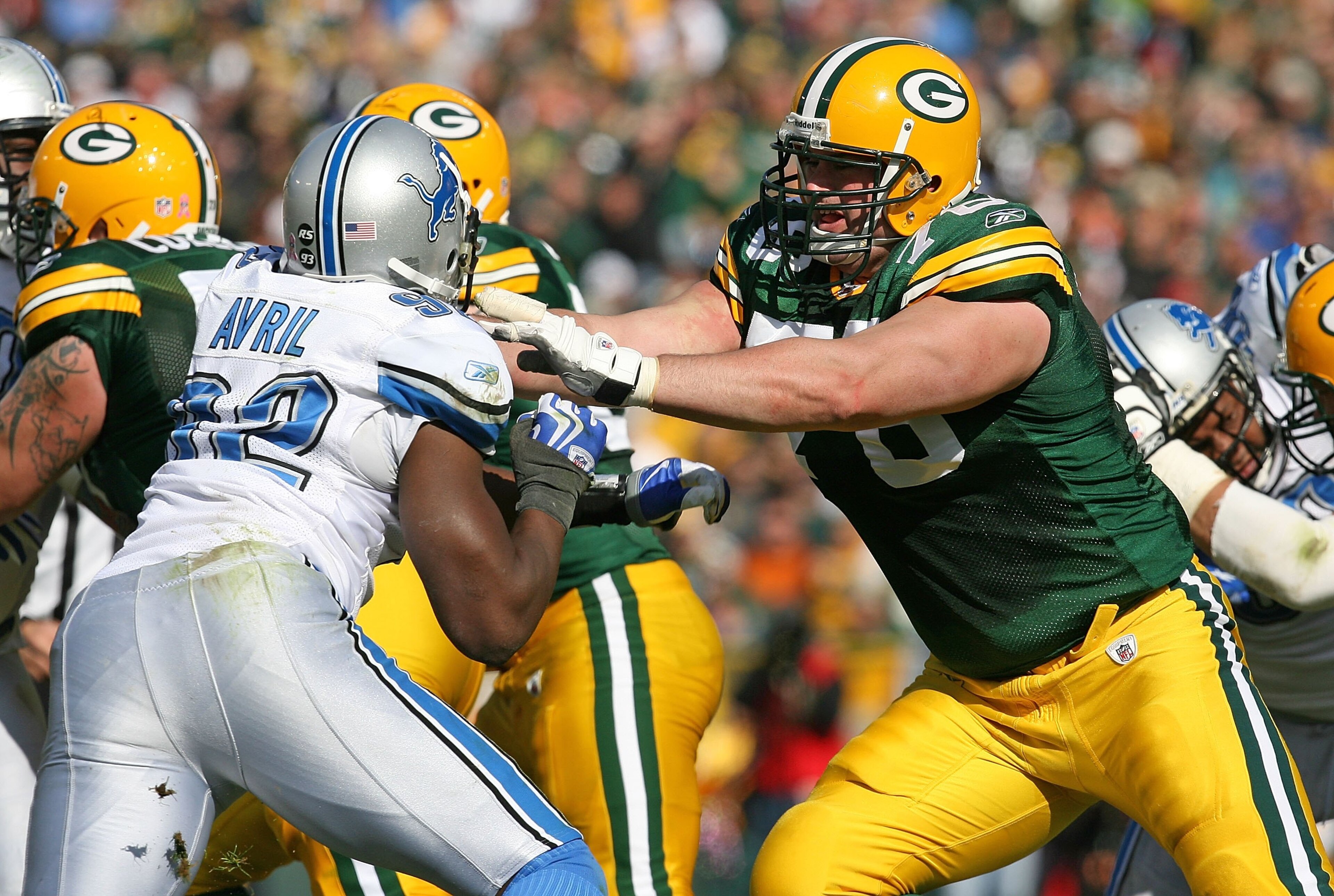 GREEN BAY, WI - OCTOBER 18: Chad Clifton #76 of the Green Bay Packers blocks Cliff Avril #92 of the Detroit Lions at Lambeau Field on October 18, 2009 in Green Bay, Wisconsin. The Packers defeated the Lions 26-0. (Photo by Jonathan Daniel/Getty Images) GREEN BAY, WI - OCTOBER 18: Chad Clifton #76 of the Green Bay Packers blocks Cliff Avril #92 of the Detroit Lions at Lambeau Field on October 18, 2009 in Green Bay, Wisconsin. The Packers defeated the Lions 26-0. (Photo by Jonathan Daniel/Getty Images)