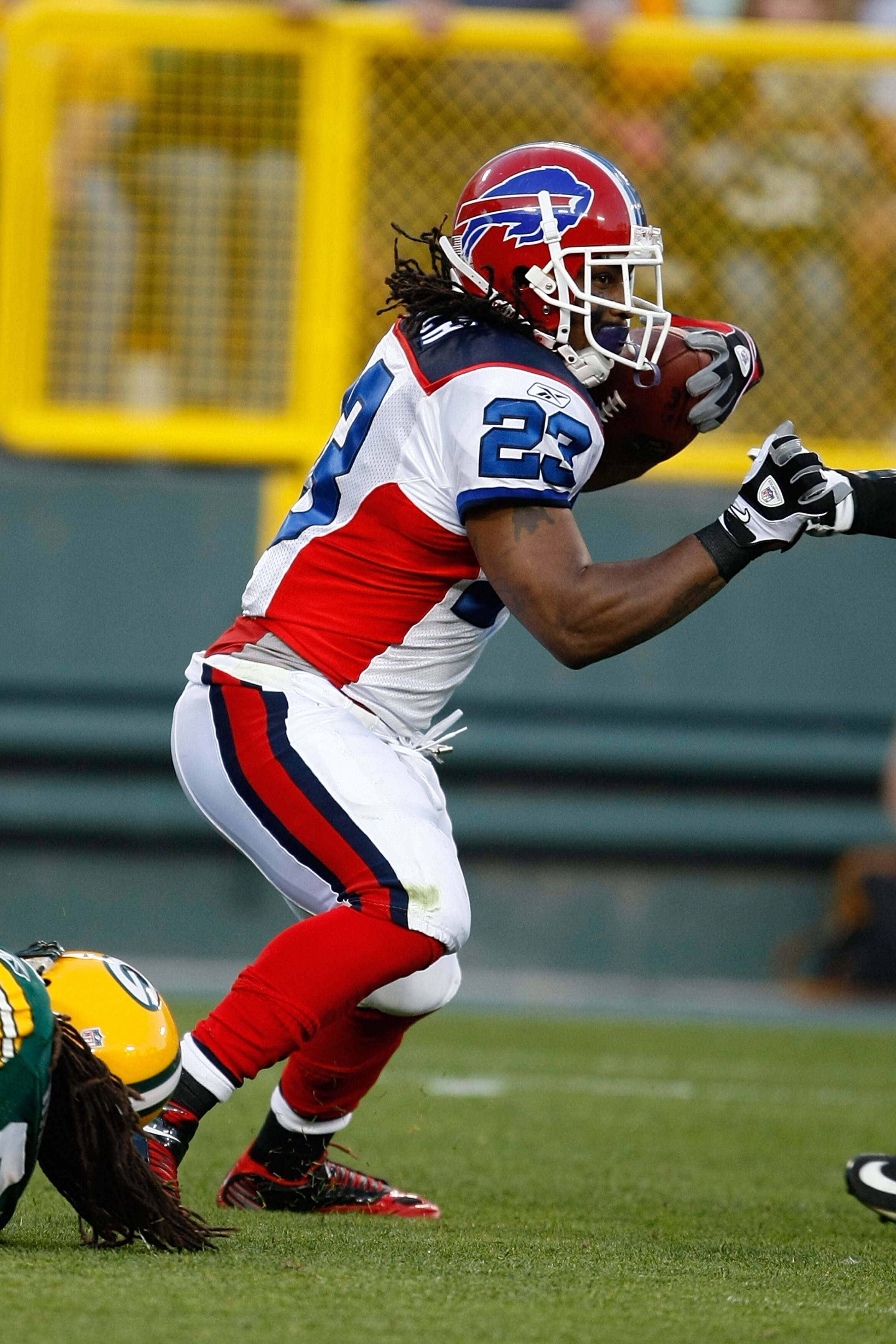 GREEN BAY, WI - AUGUST 22: Running back Marshawn Lynch #23 of the Buffalo Bills runs with the football against the Green Bay Packers at Lambeau Field on August 22, 2009 in Green Bay. Wisconsin.  (Photo by Scott Boehm/Getty Images)