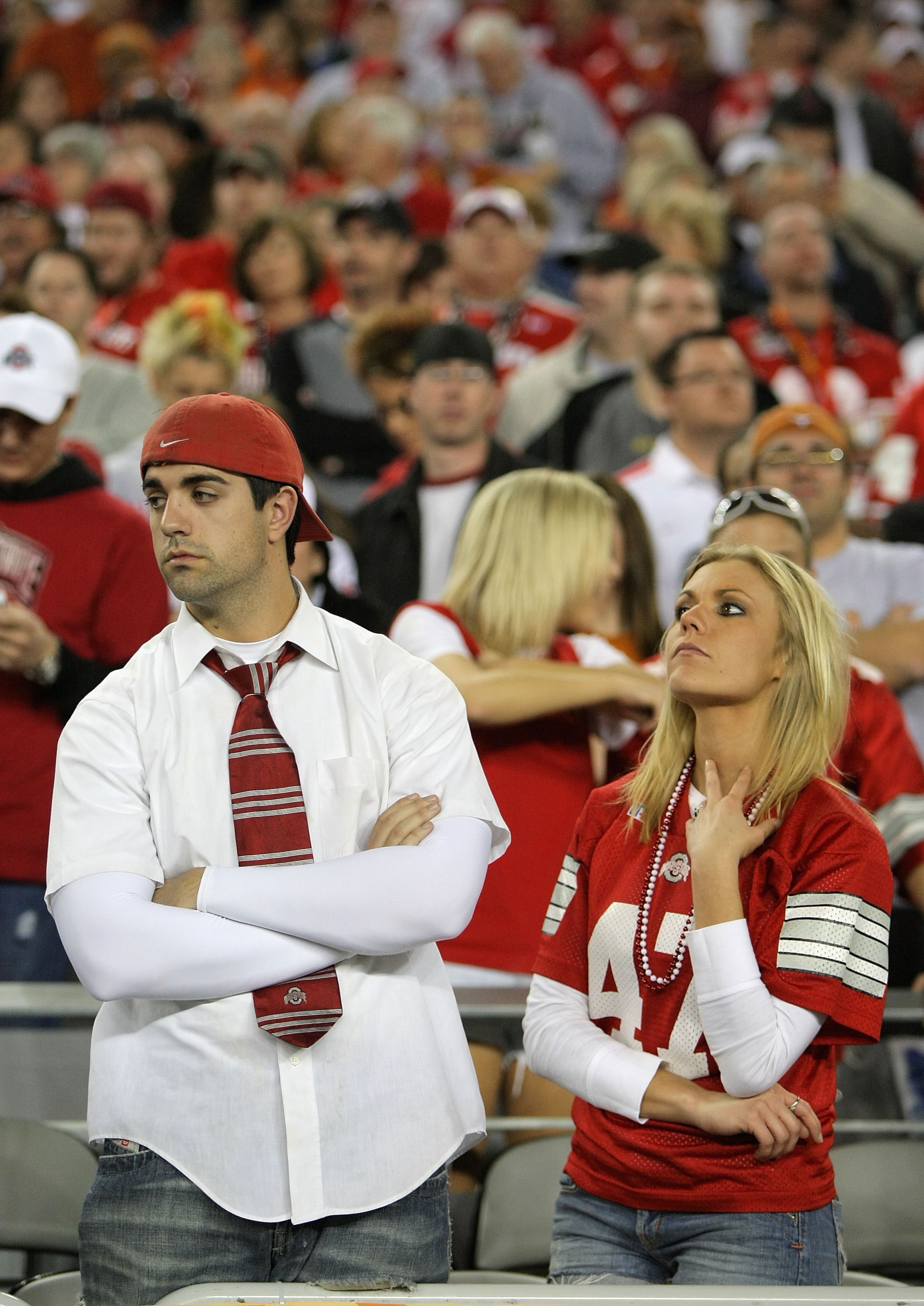 GLENDALE, AZ - JANUARY 05:   Fans of the Ohio State Buckeyes react after being defeated by the Texas Longhorns in the Tostitos Fiesta Bowl Game on January 5, 2009 at University of Phoenix Stadium in Glendale, Arizona. The Longhorns defeated the Buckeyes 2
