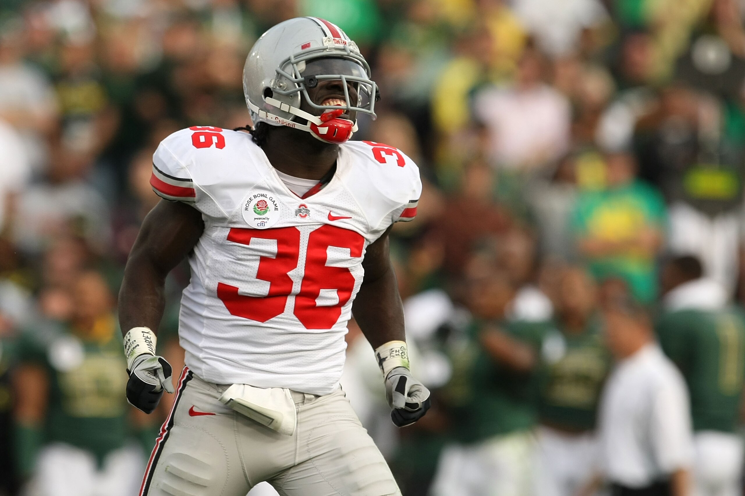 PASADENA, CA - JANUARY 01:  Linebacker Brian Rolle #36 of the Ohio State Buckeyes reacts to a play against the Oregon Ducks in the 96th Rose Bowl game on January 1, 2010 in Pasadena, California.  (Photo by Stephen Dunn/Getty Images)