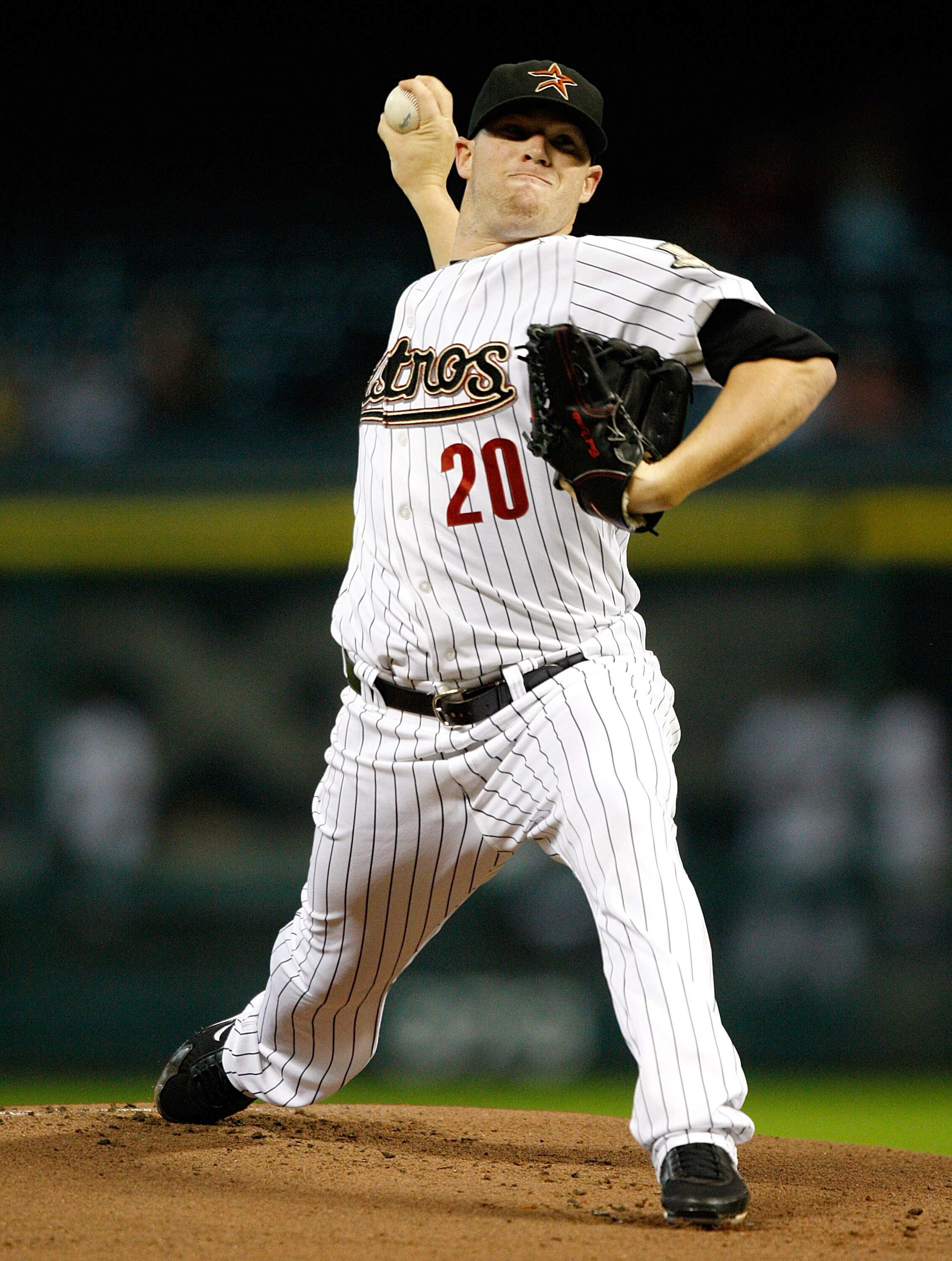 HOUSTON - AUGUST 19:  Pitcher Bud Norris #20 of the Houston Astros throws against the New York Mets in the first inning at Minute Maid Park on August 19, 2010 in Houston, Texas.  (Photo by Bob Levey/Getty Images)