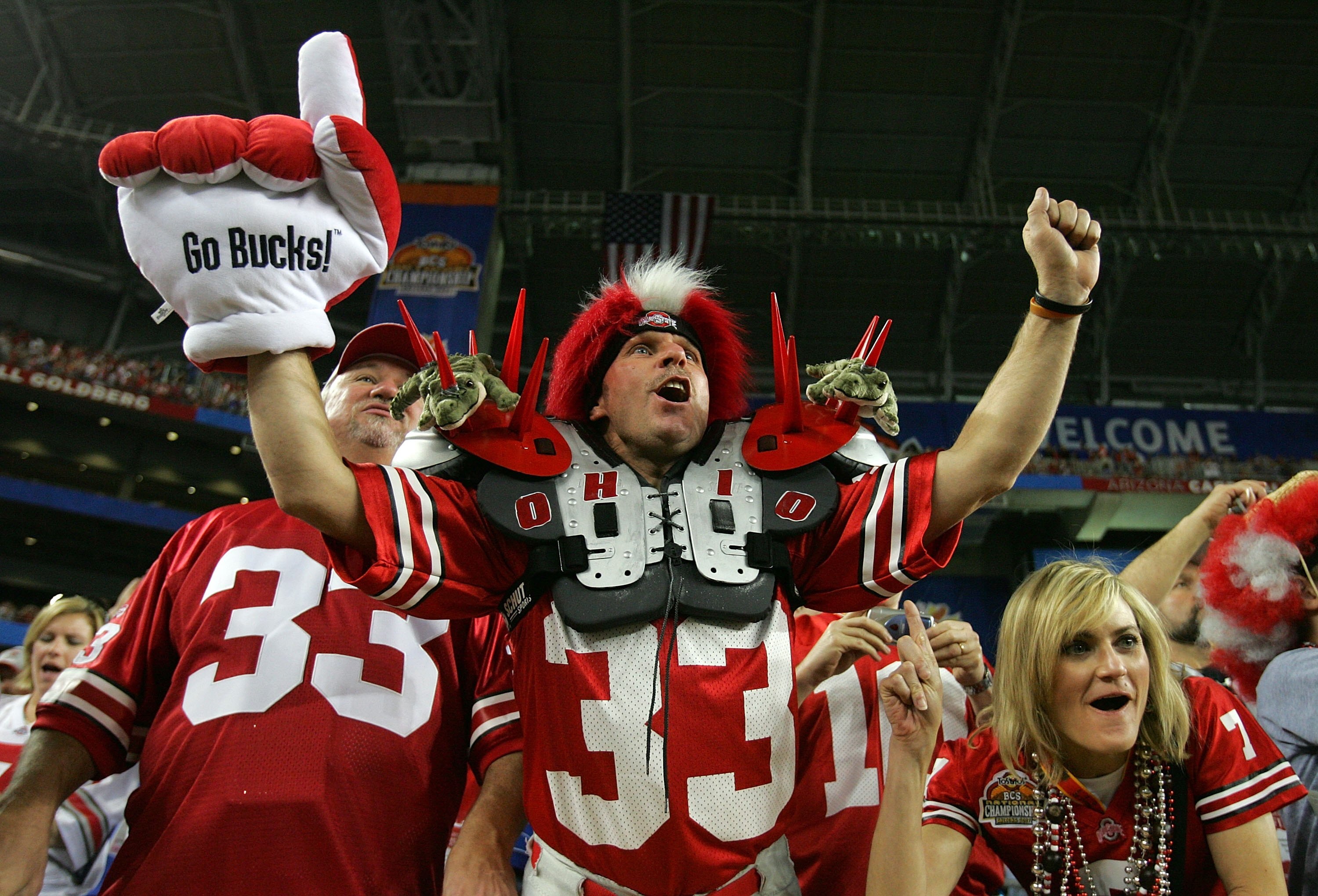 GLENDALE, AZ - JANUARY 08: Ohio State Buckeyes fans cheer on their team in the first half of the 2007 Tostitos BCS National Championship Game against the Florida Gators at the University of Phoenix Stadium on January 8, 2007 in Glendale, Arizona.  (Photo