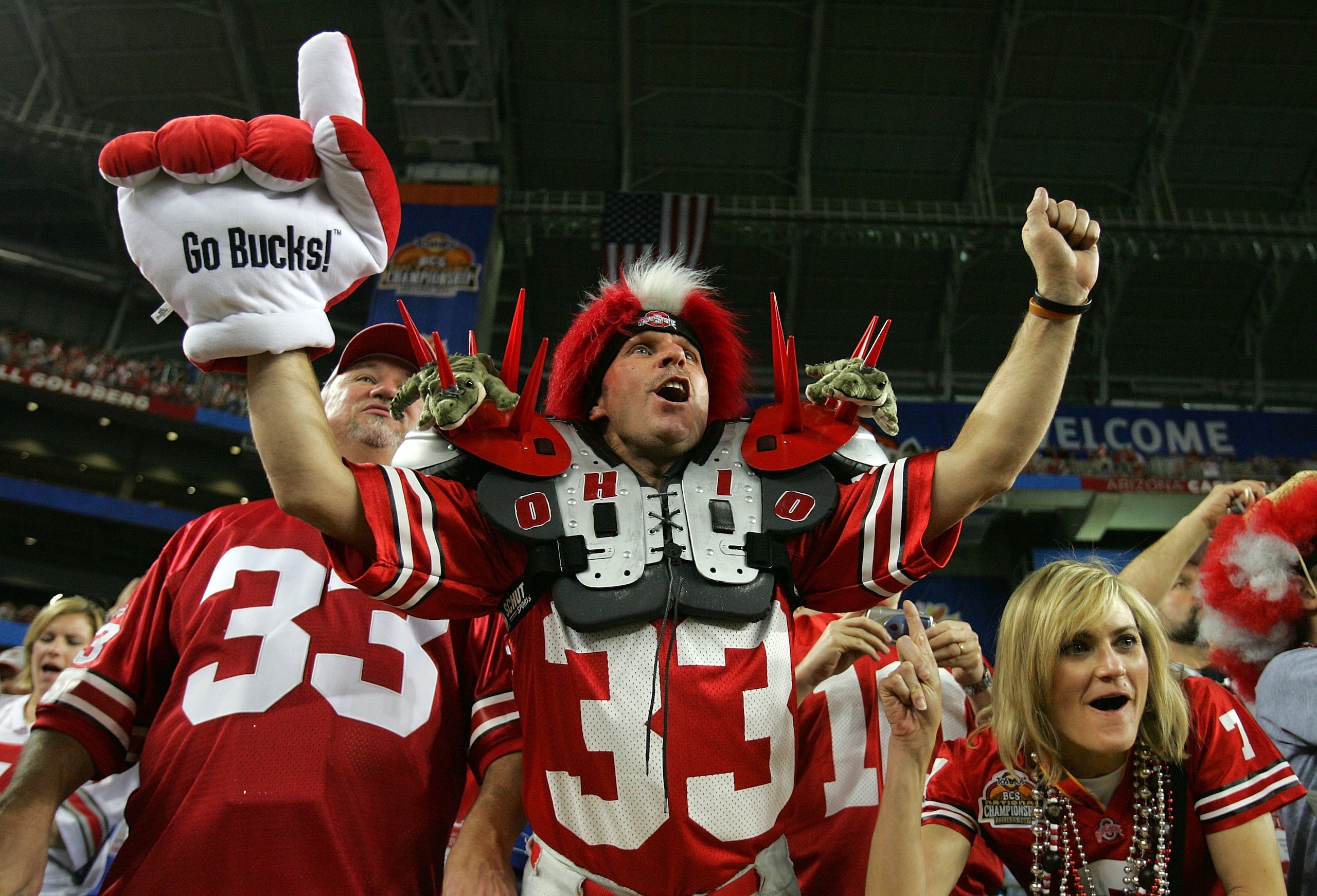 GLENDALE, AZ - JANUARY 08: Ohio State Buckeyes fans cheer on their team in the first half of the 2007 Tostitos BCS National Championship Game against the Florida Gators at the University of Phoenix Stadium on January 8, 2007 in Glendale, Arizona.  (Photo