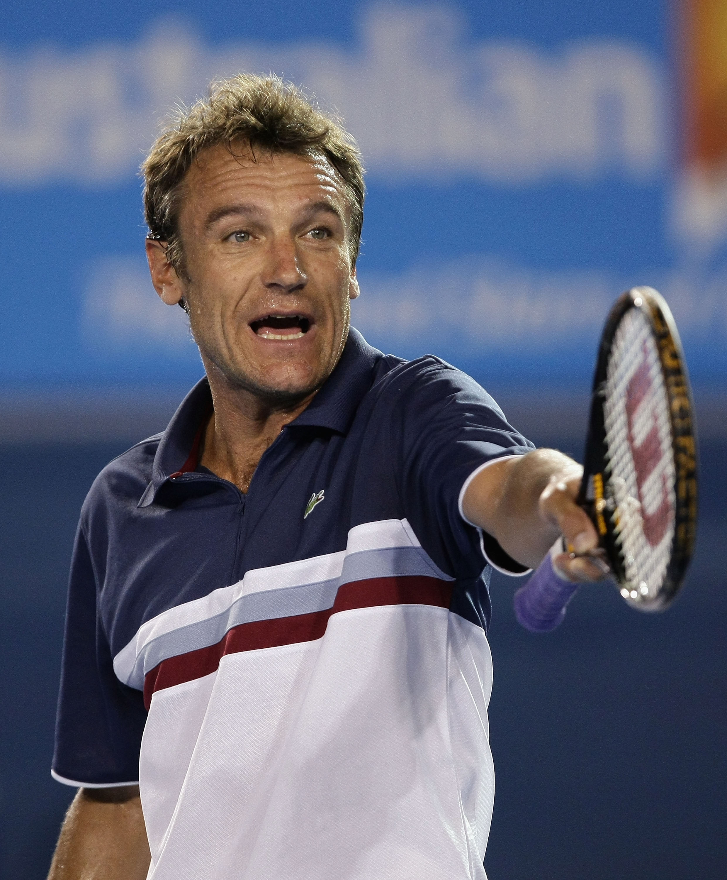 MELBOURNE, AUSTRALIA - JANUARY 29:  Mats Wilander of Sweden reacts after a point in his legends match against Pat Cash of Australia during day eleven of the 2009 Australian Open at Melbourne Park on January 29, 2009 in Melbourne, Australia.  (Photo by Luc