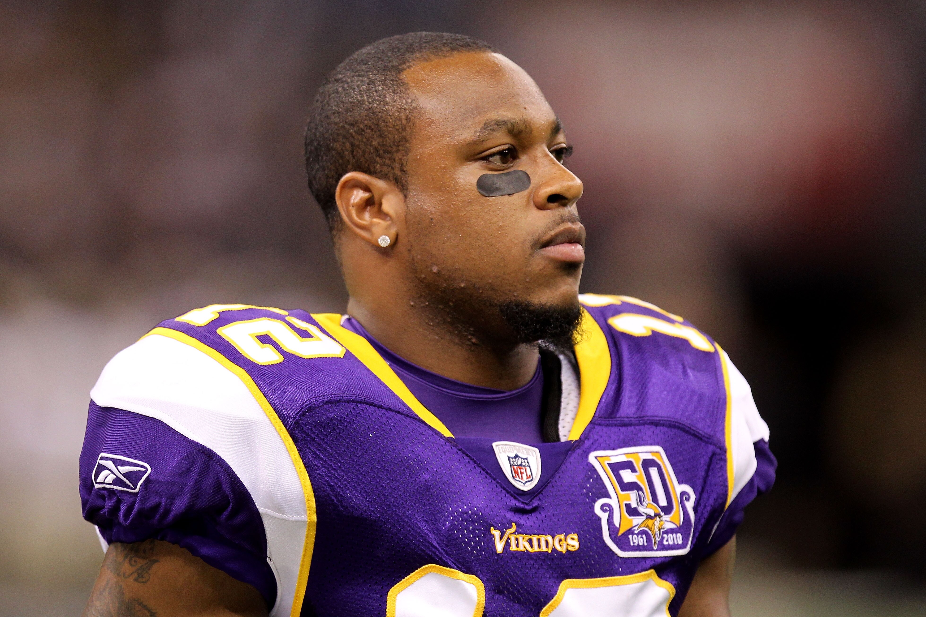 NEW ORLEANS - SEPTEMBER 09:  Percy Harvin #12 of  the Minnesota Vikings looks on against the New Orleans Saints at Louisiana Superdome on September 9, 2010 in New Orleans, Louisiana.  (Photo by Ronald Martinez/Getty Images)