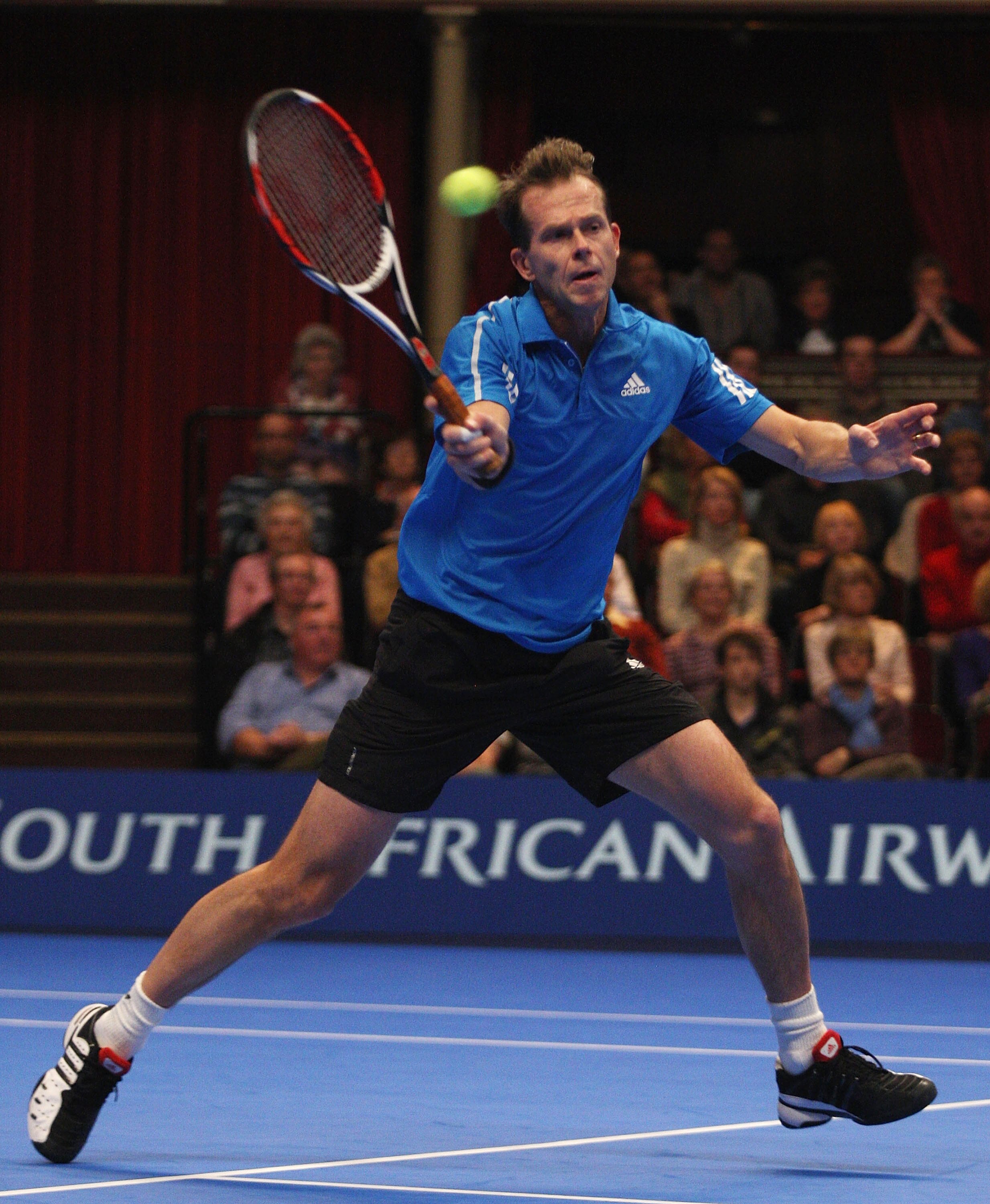 LONDON, ENGLAND - DECEMBER 06:  Stefan Edberg of Sweden plays a forehand during the Singles Final against Pat Rafter of Australia during day six of the AEGON Masters Tennis at the Royal Albert Hall on December 6, 2009 in London, England.  (Photo by Mark W