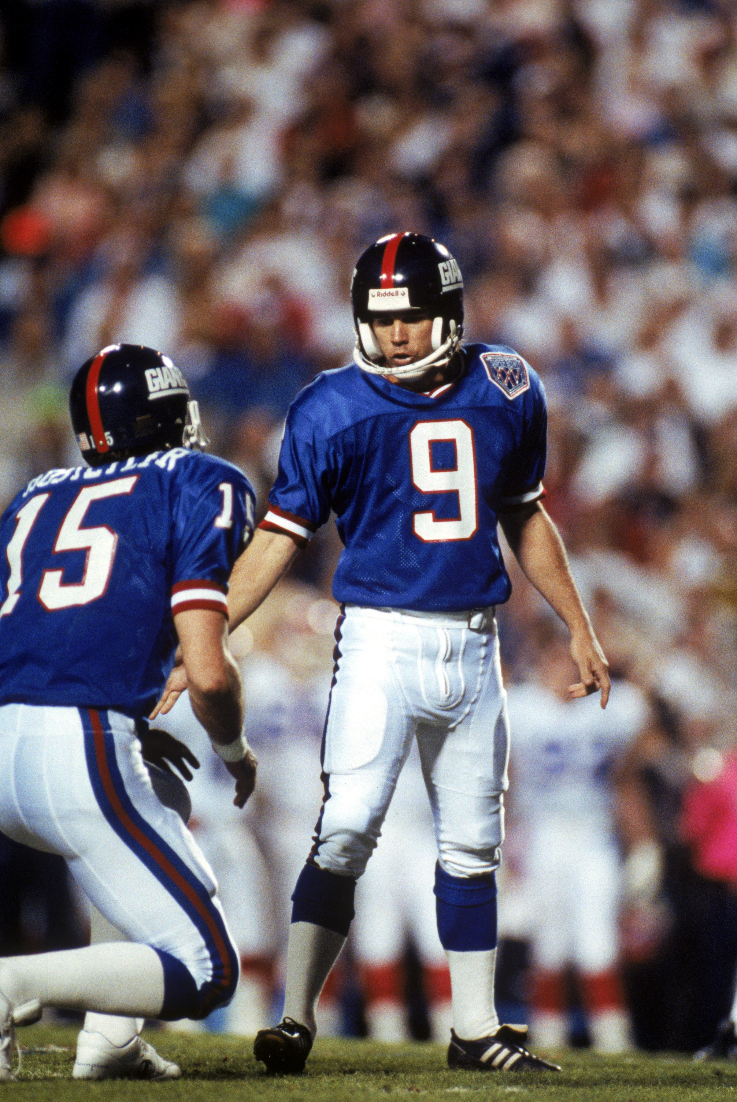 TAMPA, FL - JANUARY 27:  Kicker Matt Bahr #9 and holder Jeff Hostetler #15 of the New York Giants react after Bahr kicked a field goal against the Buffalo Bills during Super Bowl XXV at Tampa Stadium on January 27, 1991 in Tampa, Florida. The Giants defea