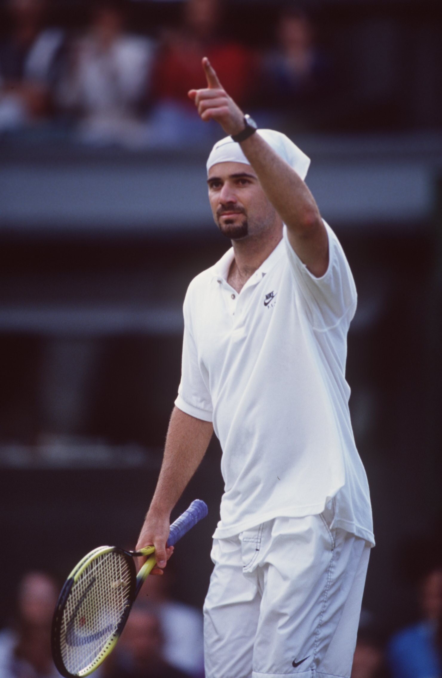1 JUL 1995:  ANDRE AGASSI OF THE UNITED STATES CELEBRATES AFTER BEATING DAVID WHEATON OF THE UNITED STATES IN THEIR THIRD ROUND MATCH AT THE WIMBLEDON TENNIS CHAMPIONSHIPS IN LONDON, ENGLAND. AGASSI WON THE MATCH 6-2, 3-6, 6-4, 6-2. Mandatory Credit: Cliv