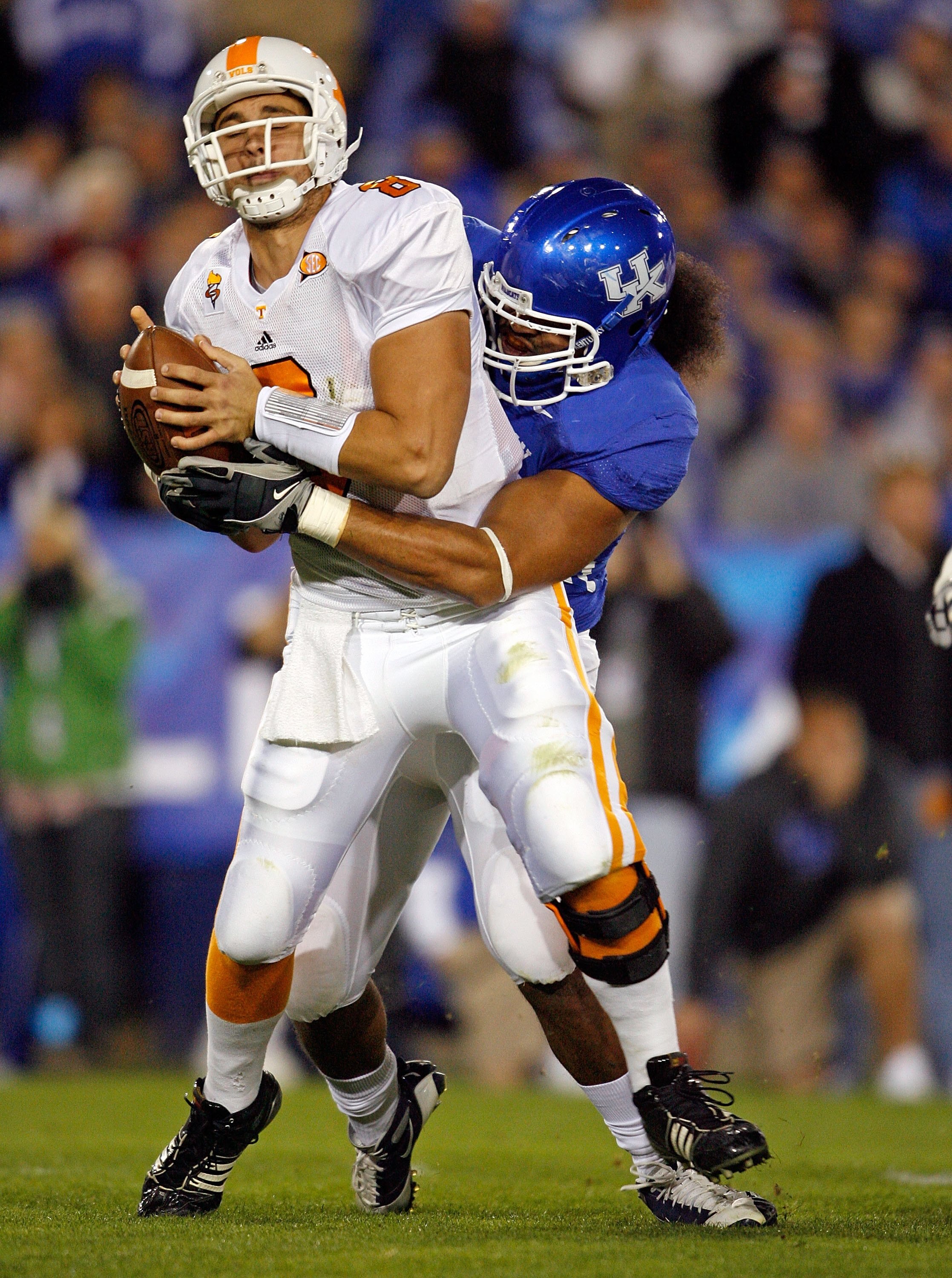 LEXINGTON, KY - NOVEMBER 28: Jonathan Crompton #8 of the Tennessee Volunteers is sacked by DeQuin Evans #55 of the Kentucky Wildcats during the SEC game at Commonwealth Stadium on November 28, 2009 in Lexington, Kentucky. (Photo by Andy Lyons/Getty Imag LEXINGTON, KY - NOVEMBER 28: Jonathan Crompton #8 of the Tennessee Volunteers is sacked by DeQuin Evans #55 of the Kentucky Wildcats during the SEC game at Commonwealth Stadium on November 28, 2009 in Lexington, Kentucky. (Photo by Andy Lyons/Getty Imag